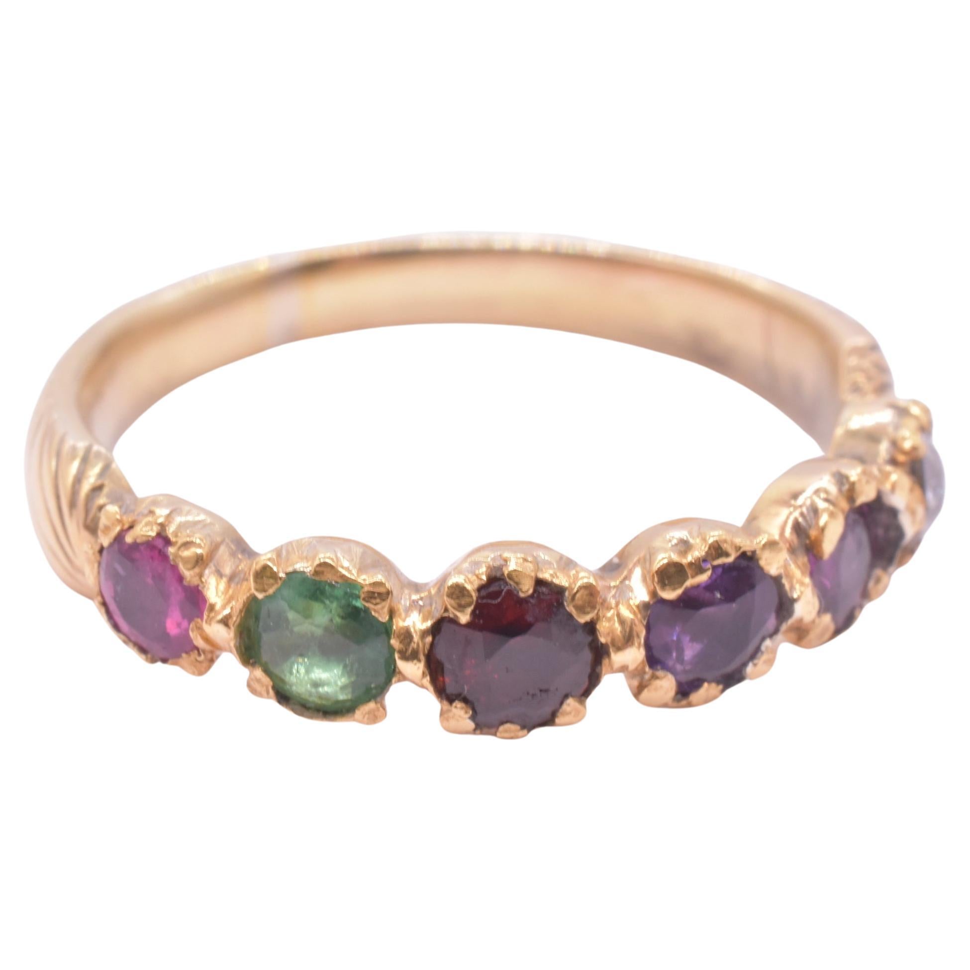 Our 18K Victorian Regard ring is a romantic  acrostic ring set in a linear formation, with six gemstones in which the initial letter of each spells the word 'Regard': Ruby, Emerald, Garnet, Amethyst, Ruby, and Diamond. 

The 18K band is delicately