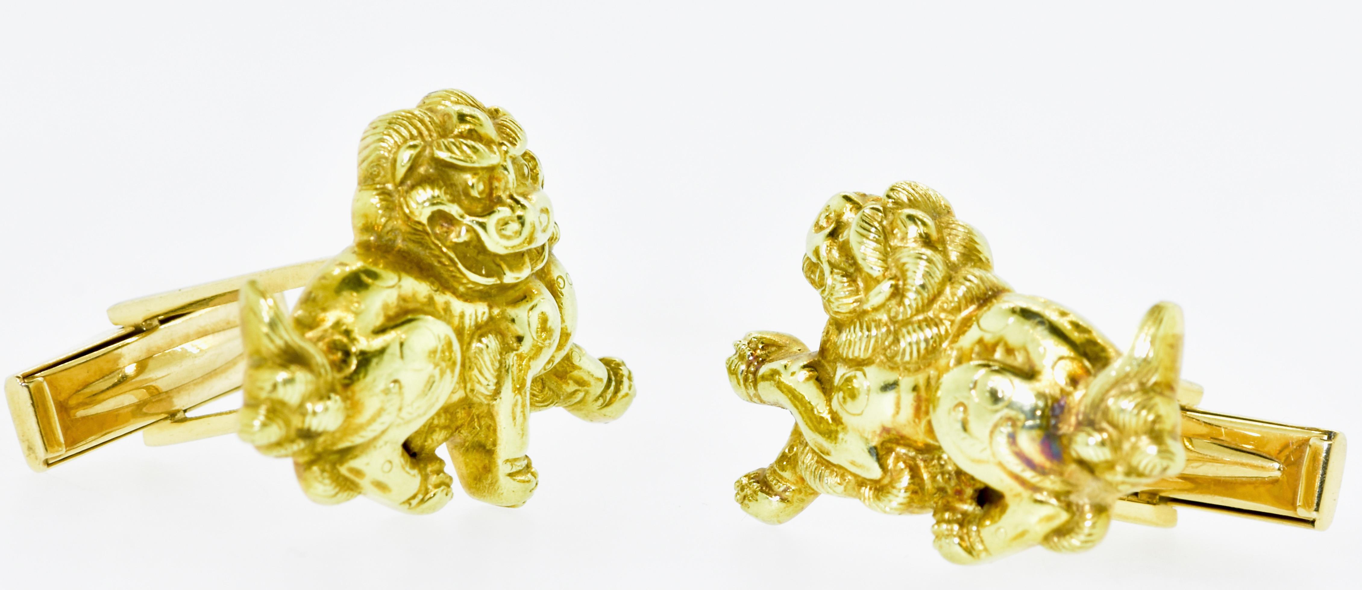 18K cufflinks of foo dogs (guardian lions) displaying  wonderful detail.   The gold finely carved foo dogs were made, at a later time into these cufflinks probably  mid-20th century.  They no doubt came from another a larger object from the 19th