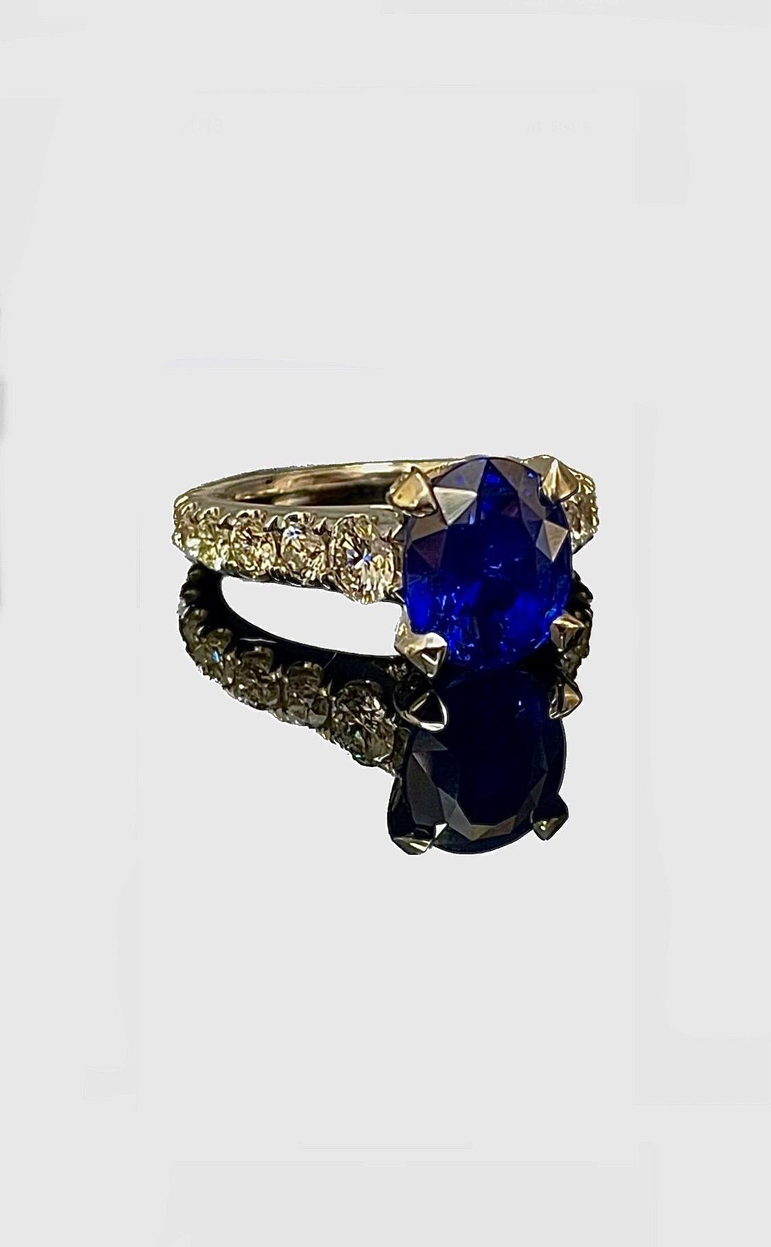 DeKara Design Collection 

Metal- 18K White Gold, .750.

Stones- GIA Certified 4.02 Carat No Heat Oval Blue Sapphire, 52 Round Diamonds G-H Color VS2 Clarity 1.60 carats.

GIA Report Number 6227026772


Size- 6.  FREE SIZING!!!!

This Roayl Blue No