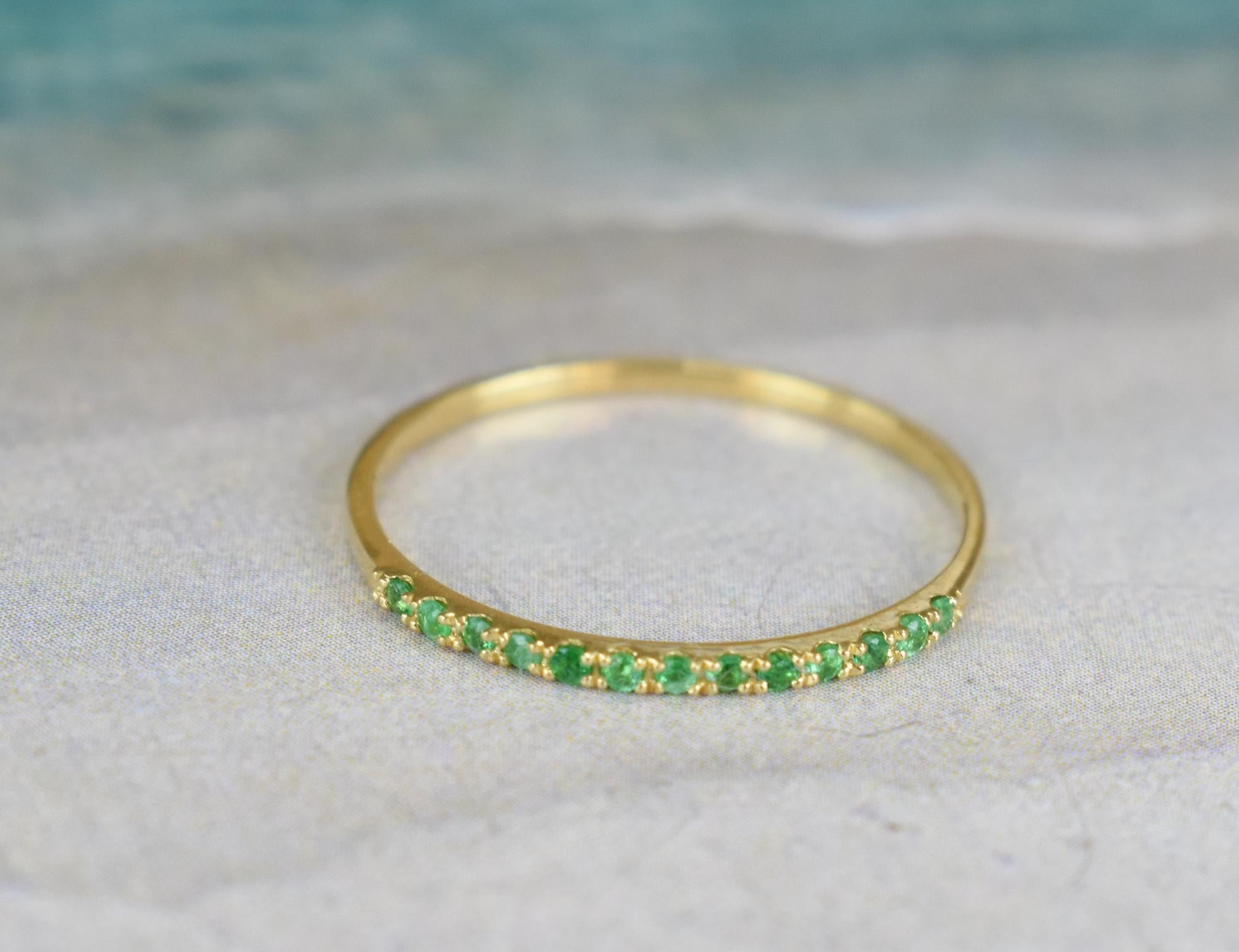 For Sale:  18k Gold 0.07 Carat Emerald Half Eternity Ring 5