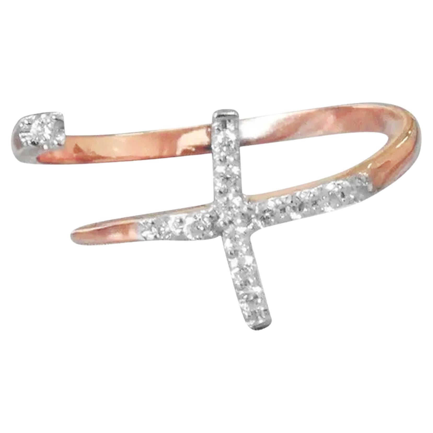 For Sale:  18k Gold 0.11 Carat diamond open cross ring