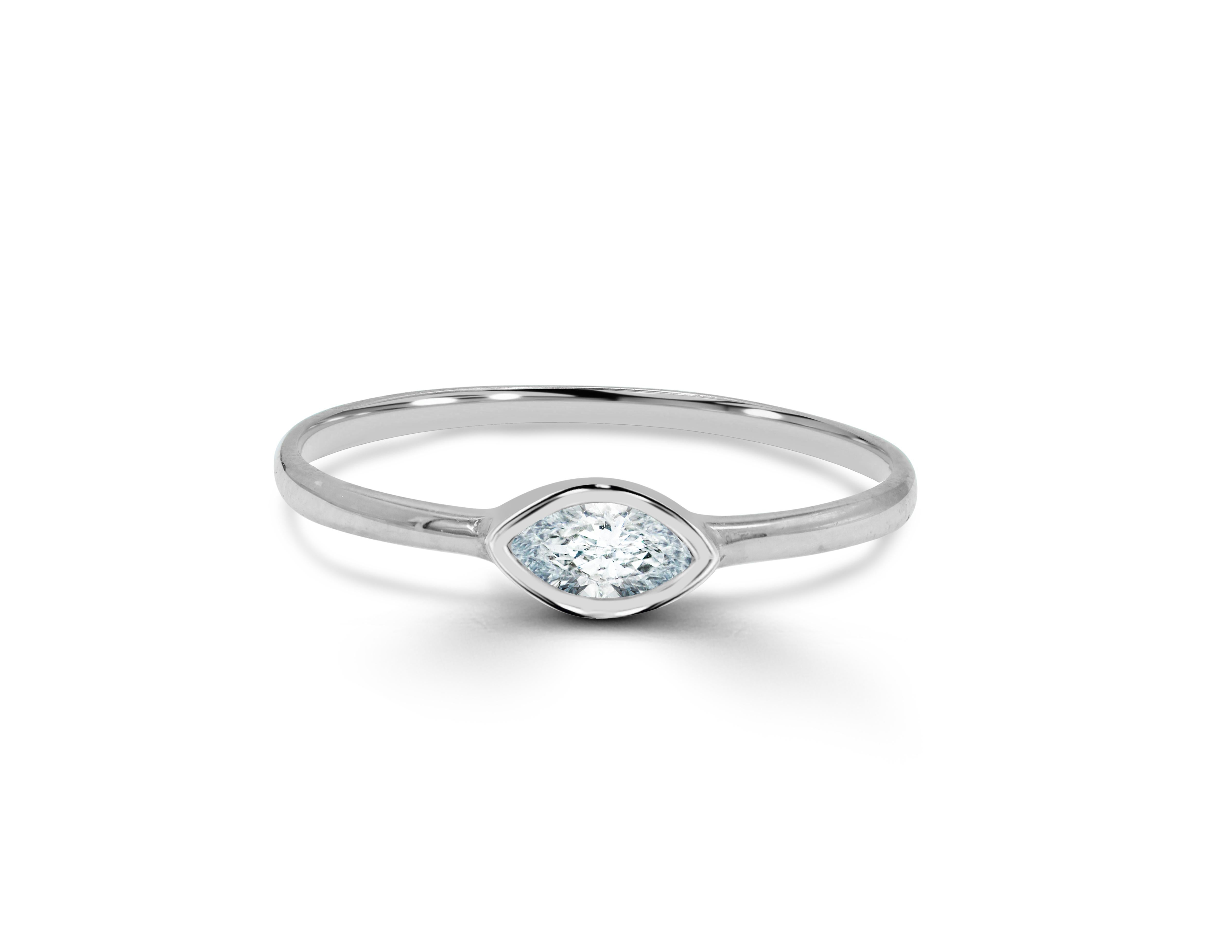En vente :  Bague de fiançailles en or 18 carats avec diamant solitaire marquise de 0,15 carat 4