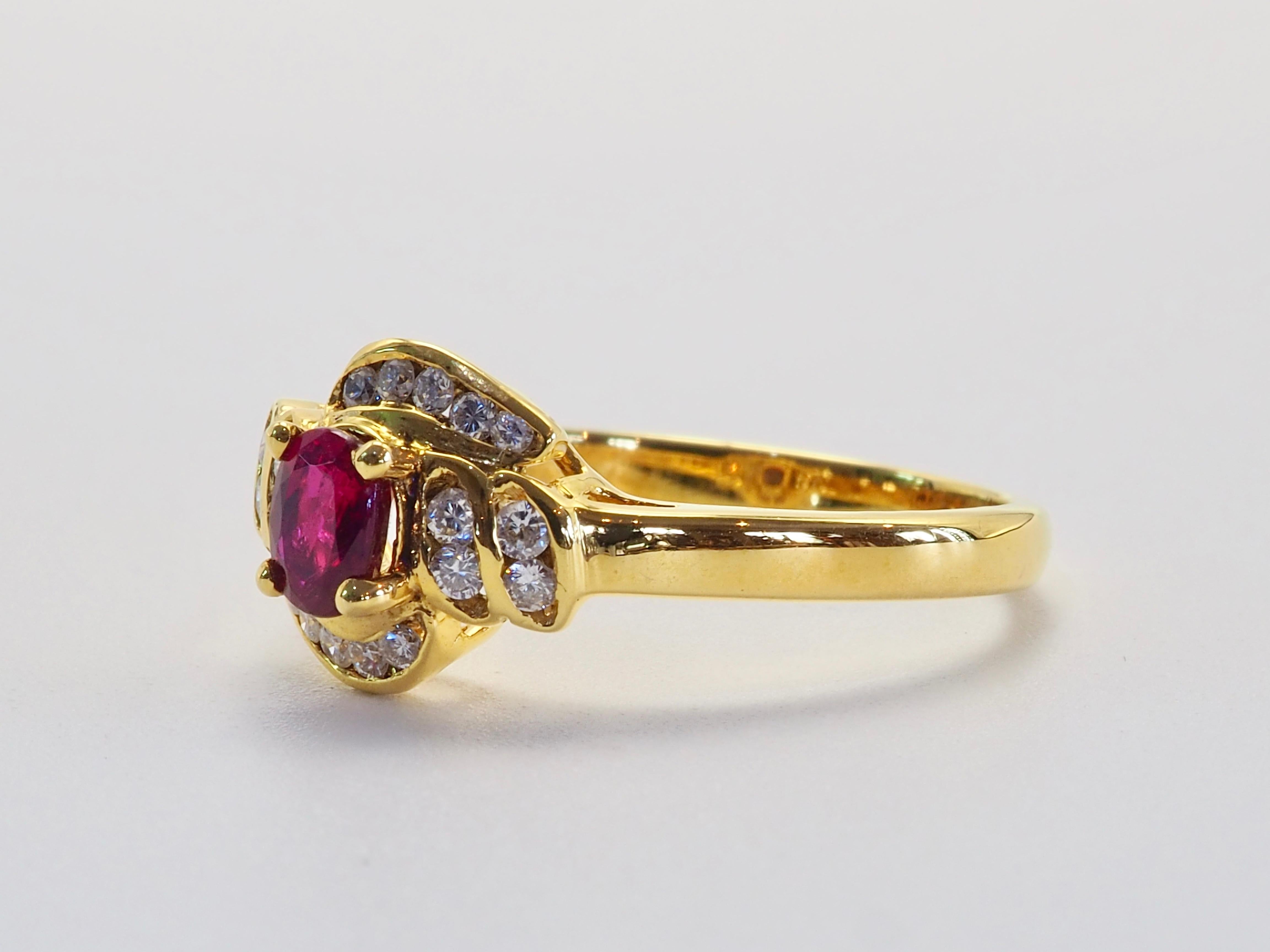 This wonderful ring boasts a vivid red oval cut ruby of 0.30 carats from Thailand. The stunning oval cut ruby is mostly clear with slight inclusions which is set in the middle of 18 round cut diamonds of good grade. Immaculate craftsmanship can be