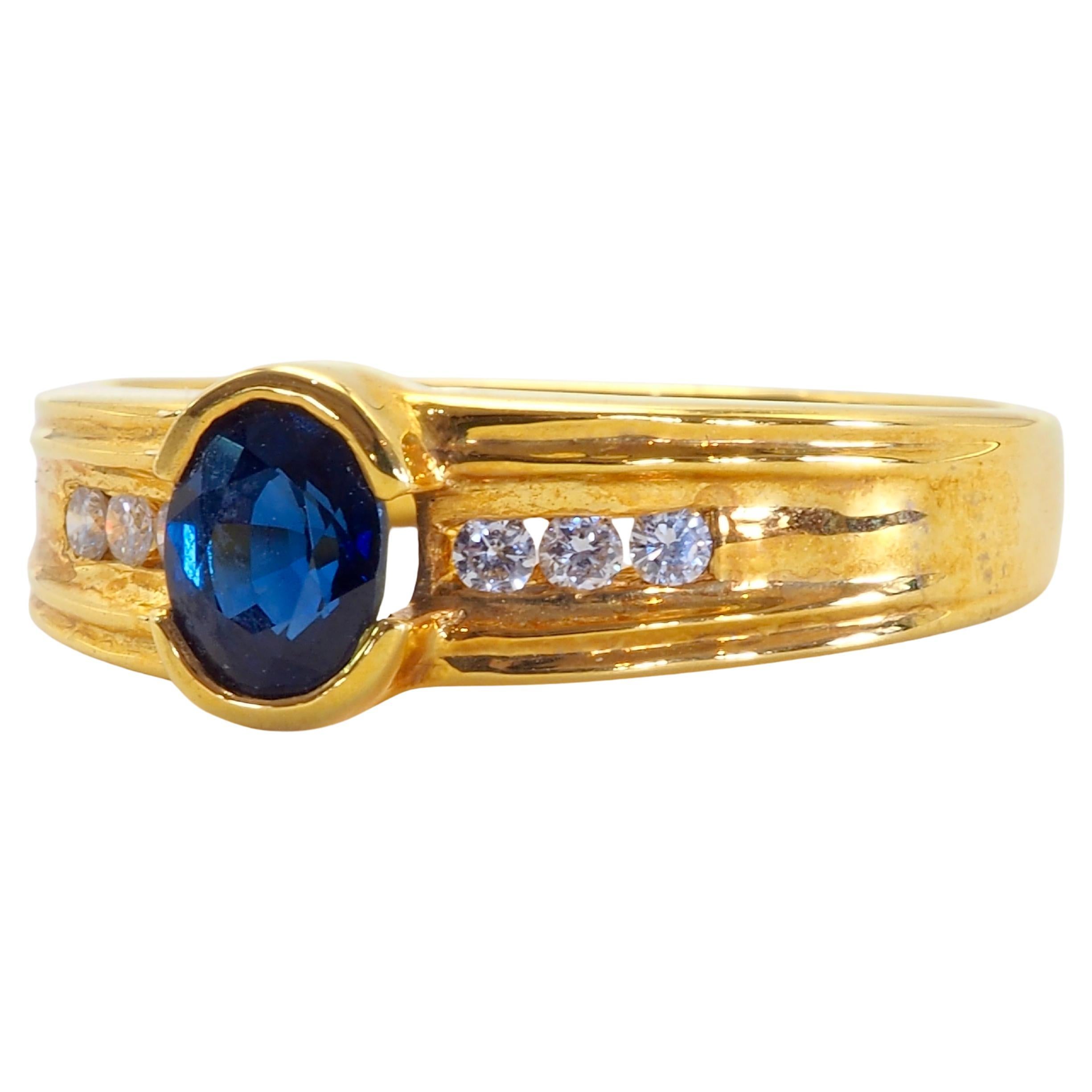 Thai blue sapphire with gorgeous fire and deep strong blue tone- for those who loves sapphires. The 6 diamonds are bright and lively and set neatly. Classic contemporary band ring accompanied by hard stone sapphire and diamonds allows this ring to