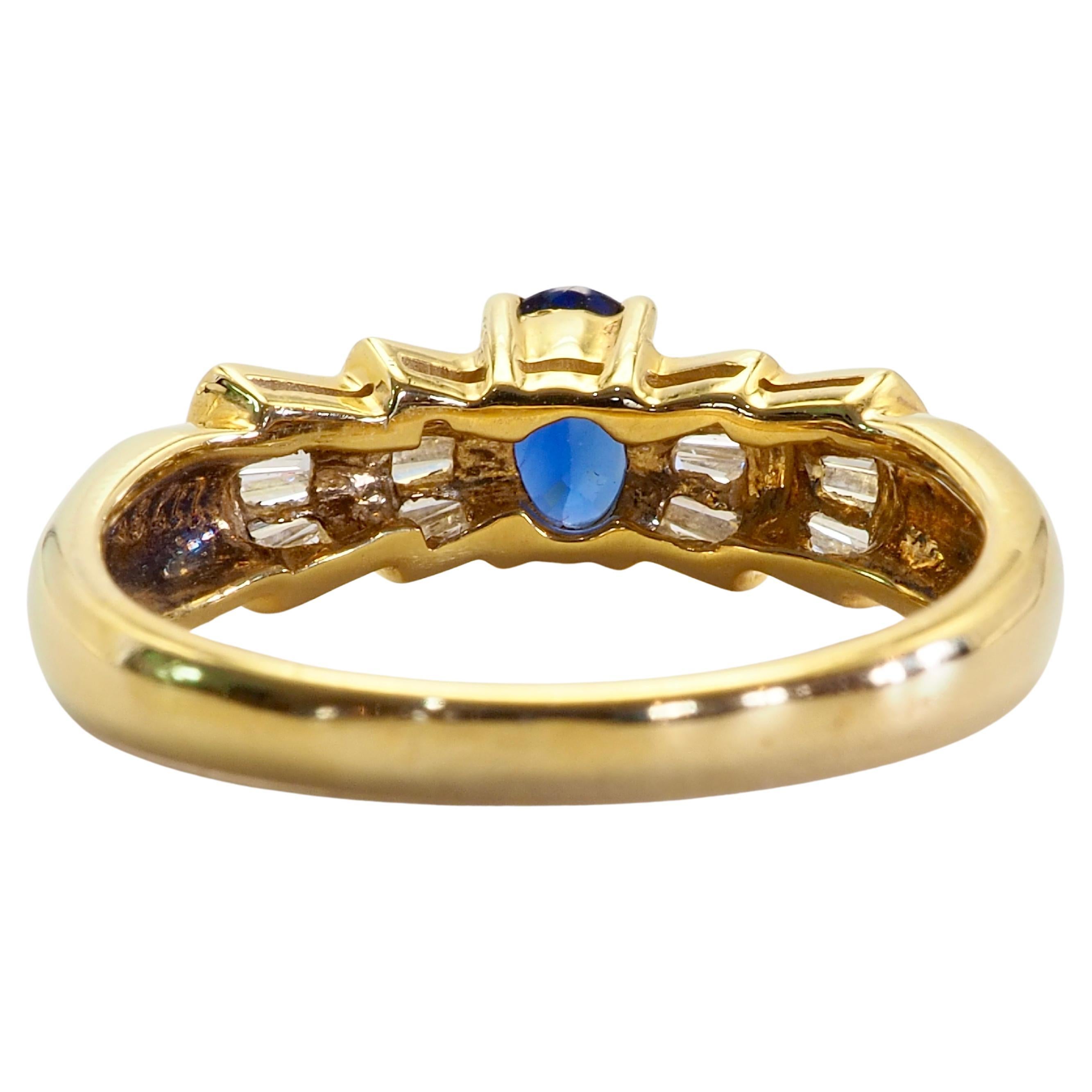 Oval Cut 18K Gold 0.60ct Vivid Blue Sapphire & 0.30ct Baguette Diamond Fine Ring For Sale