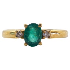 18K Gold 0,62ct Oval Smaragd & 0,06ct Brillant Diamant Ring