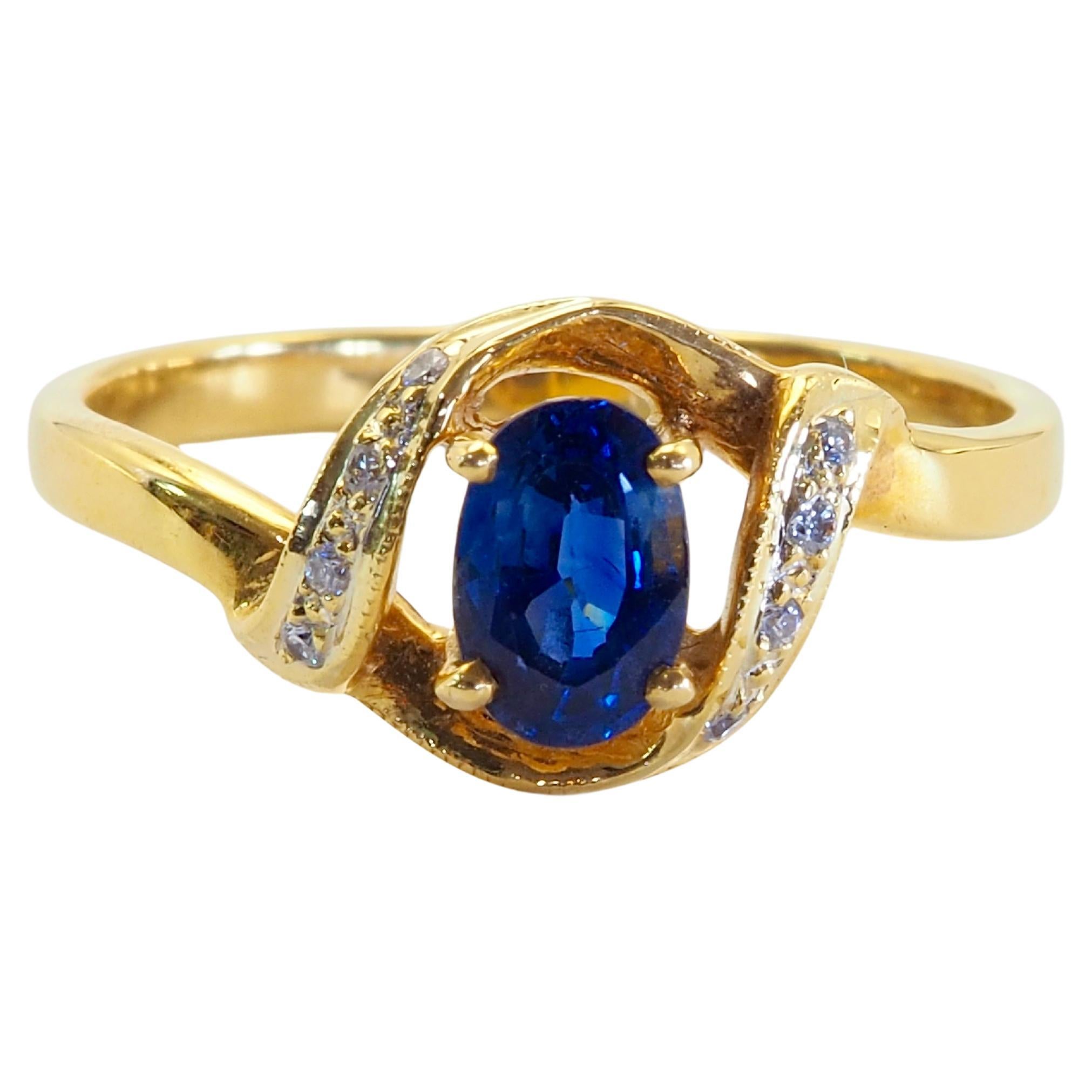 18K Gold 0.62ct Vivid Blue Sapphire & 0.05ct Round Diamond Ring