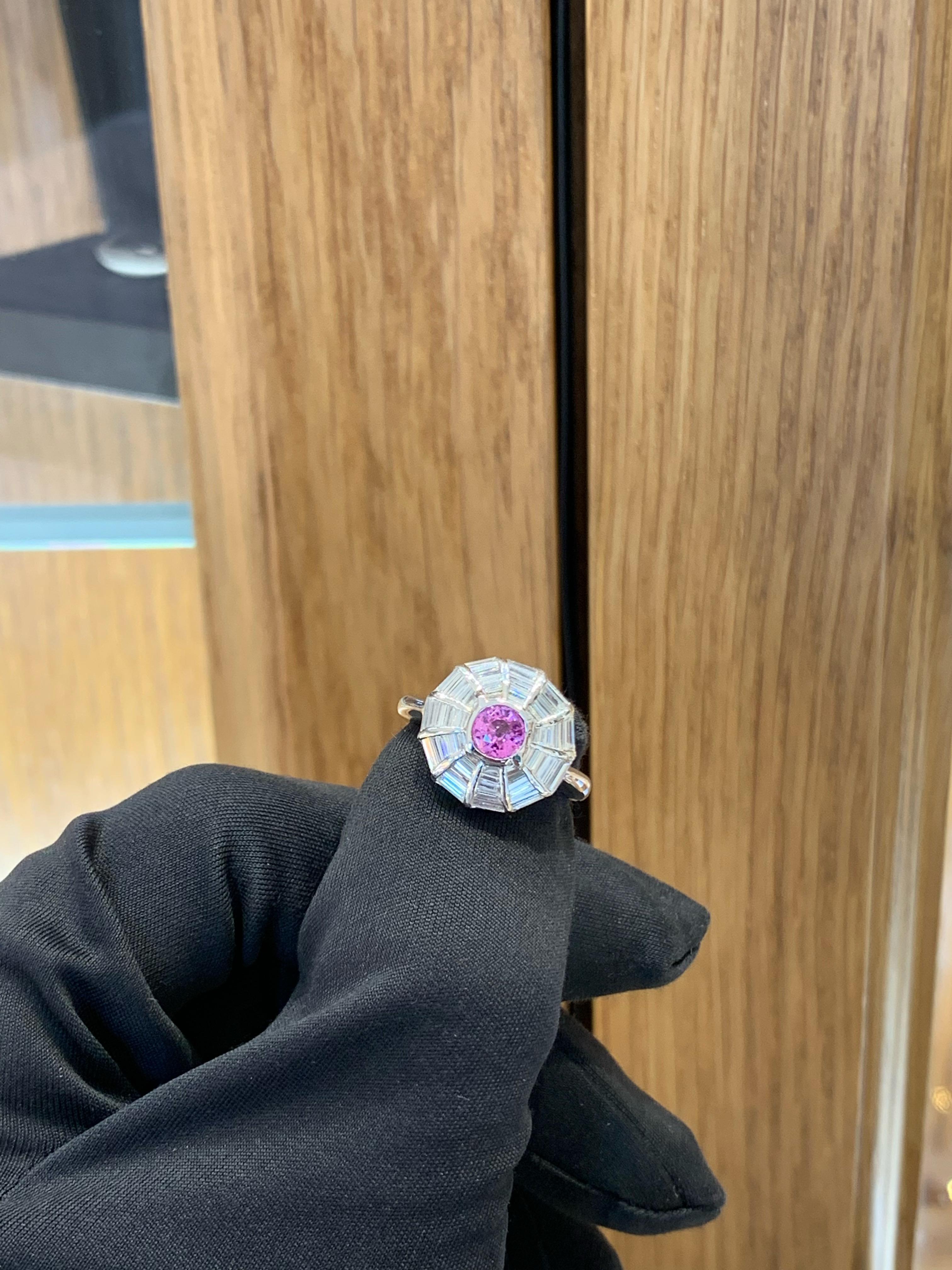 Beautiful Pink Sapphire & Diamond Ring Set In 18k White Gold.
Amazing Shine, Incredible Craftsmanship.
Great Statement Piece.
Very Well Crafted.
Approximately 0.75 Carats Pink Sapphire.
Approximately 2.0 Carats Baguette Cut Diamonds.
Nice & Clean