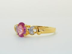 18K Gold 0.79ct Oval Hot Pink Sapphire & 0.06ct Diamond Engagement Ring