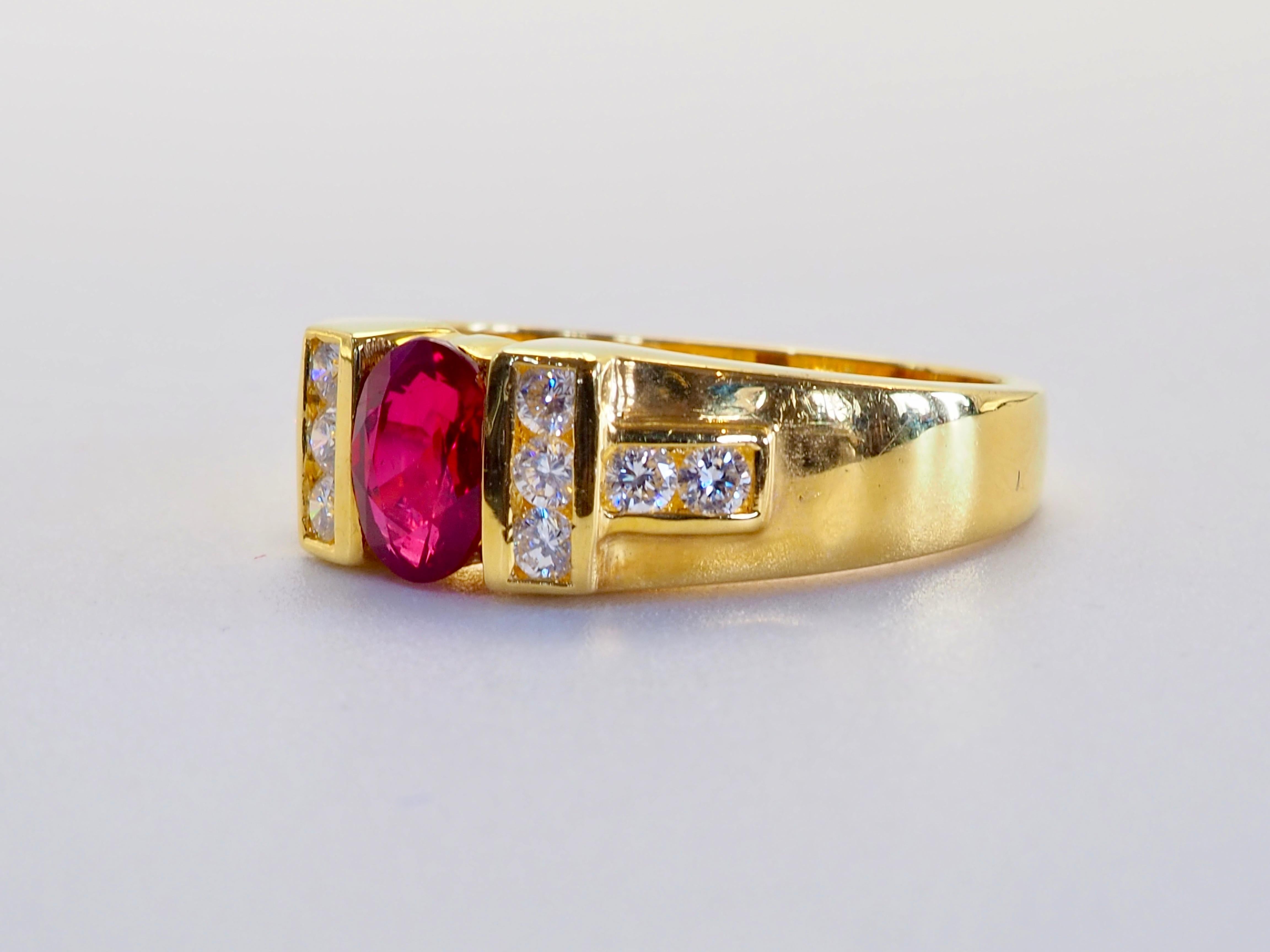 This wonderful ring boasts a red oval cut ruby of 0.83 carats. The stunning oval cut ruby is very clear and with good refraction. The color is almost Pigeon's Blood with a little purplish hue. 
The diamonds are of high quality with decent size,