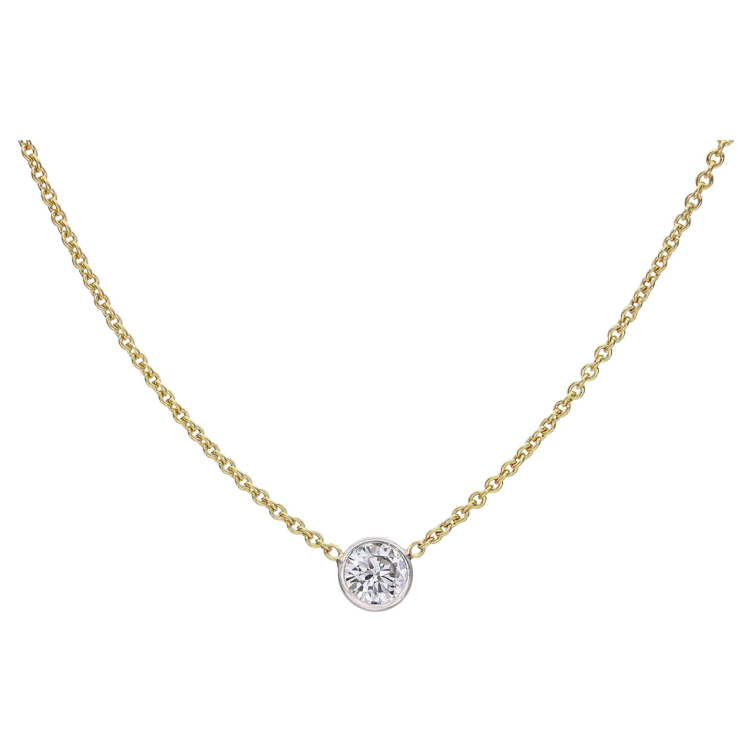 Collier solitaire en or 18k serti d
un diamant H VS de 0,90ct