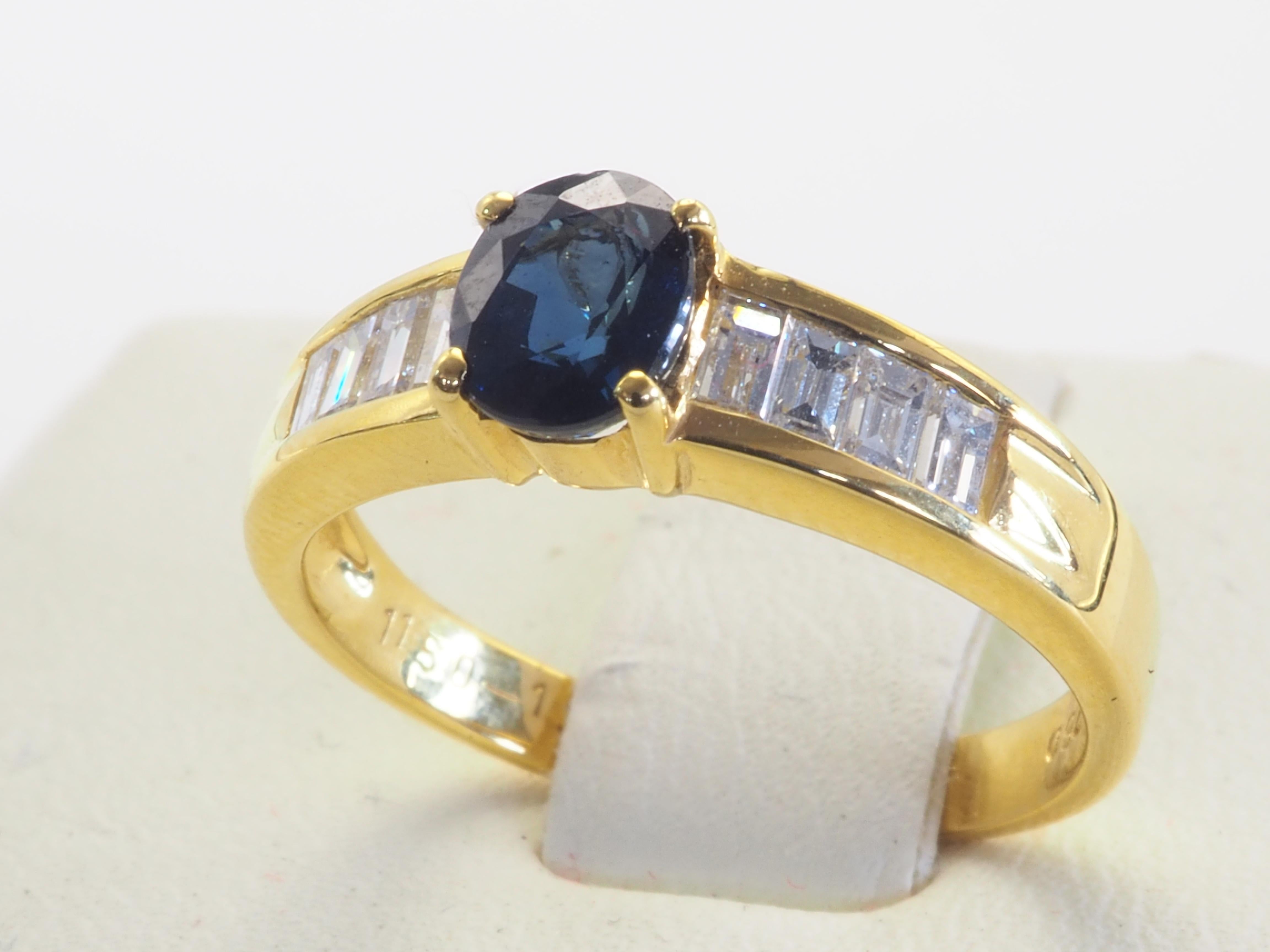 Women's 18k Gold 0.90ct Oval Blue Sapphire & 0.50ct Baguette Diamond Engagement Ring For Sale