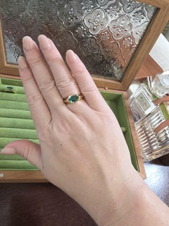 18K Gold 0.96 Carat Emerald Lozenge Cut Half Bezel Ring