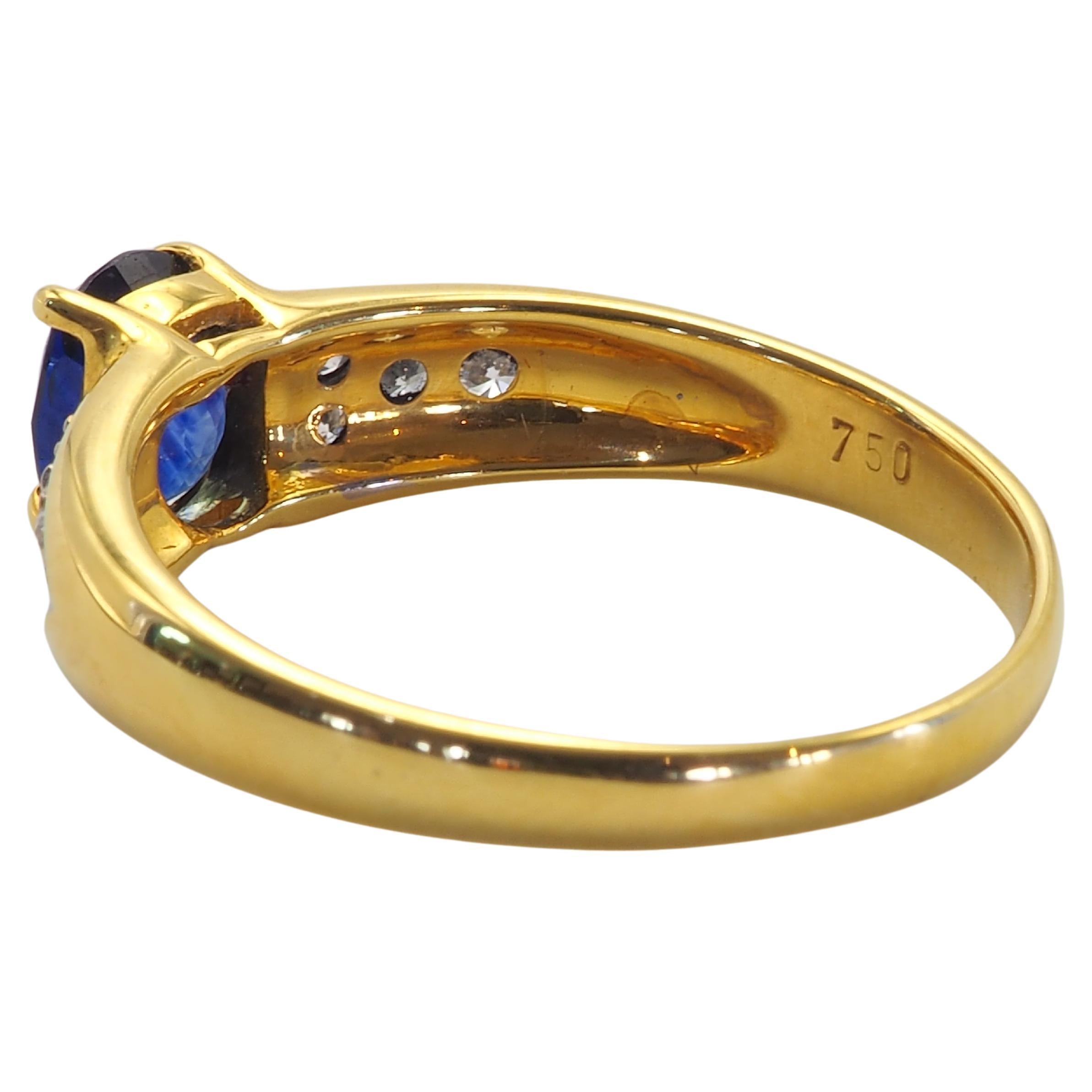 Taille ovale Bague fine en or 18 carats avec saphir bleu de 1,00 carat et diamant de 0,20 carat en vente
