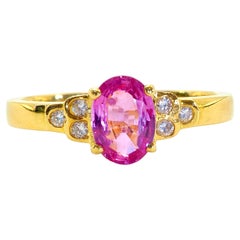 Anello di fidanzamento in oro 18K con zaffiro rosa ovale da 1,00ct e diamante da 0,08ct
