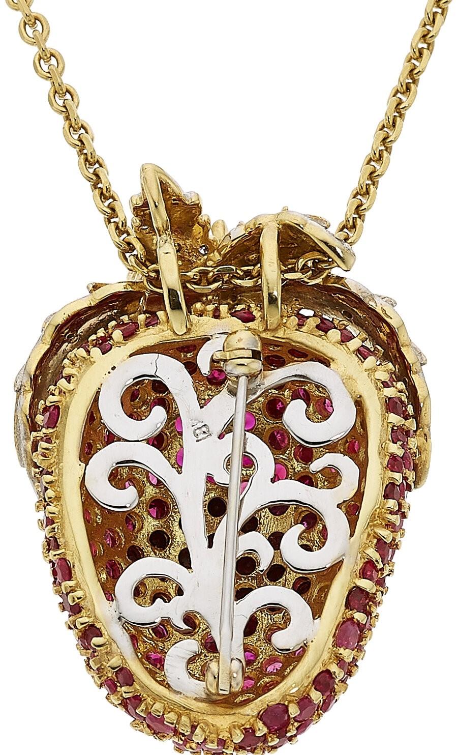 Gross Weight: 42.2grams
Strawberry Pendant-Brooch 
Step and full-cut Diamonds weighing 1.50 carats
Round-cut Rubies weighing 10.00 carats
Dimensions: 1 9/16
