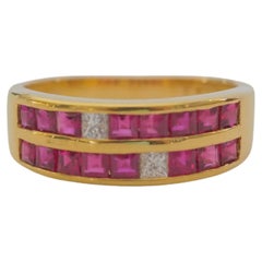18K Gold 1.20ct Square Cut Ruby 
0.12ct Princess Diamond Two Row Band Ring