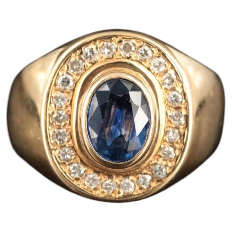 Bague-sceau en or 18 carats, sertie d'un saphir ovale facetté de 1,28 carat et de diamants