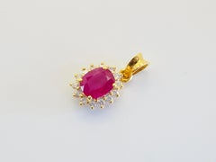 18K Gold 1.30ct Oval Thai Ruby & 0.17ct Diamond Sunburst Pendant