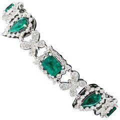 Gliederarmband, 18 Karat Gold 13,43 Karat GIA kolumbianischer Smaragd und Schmetterling Diamant