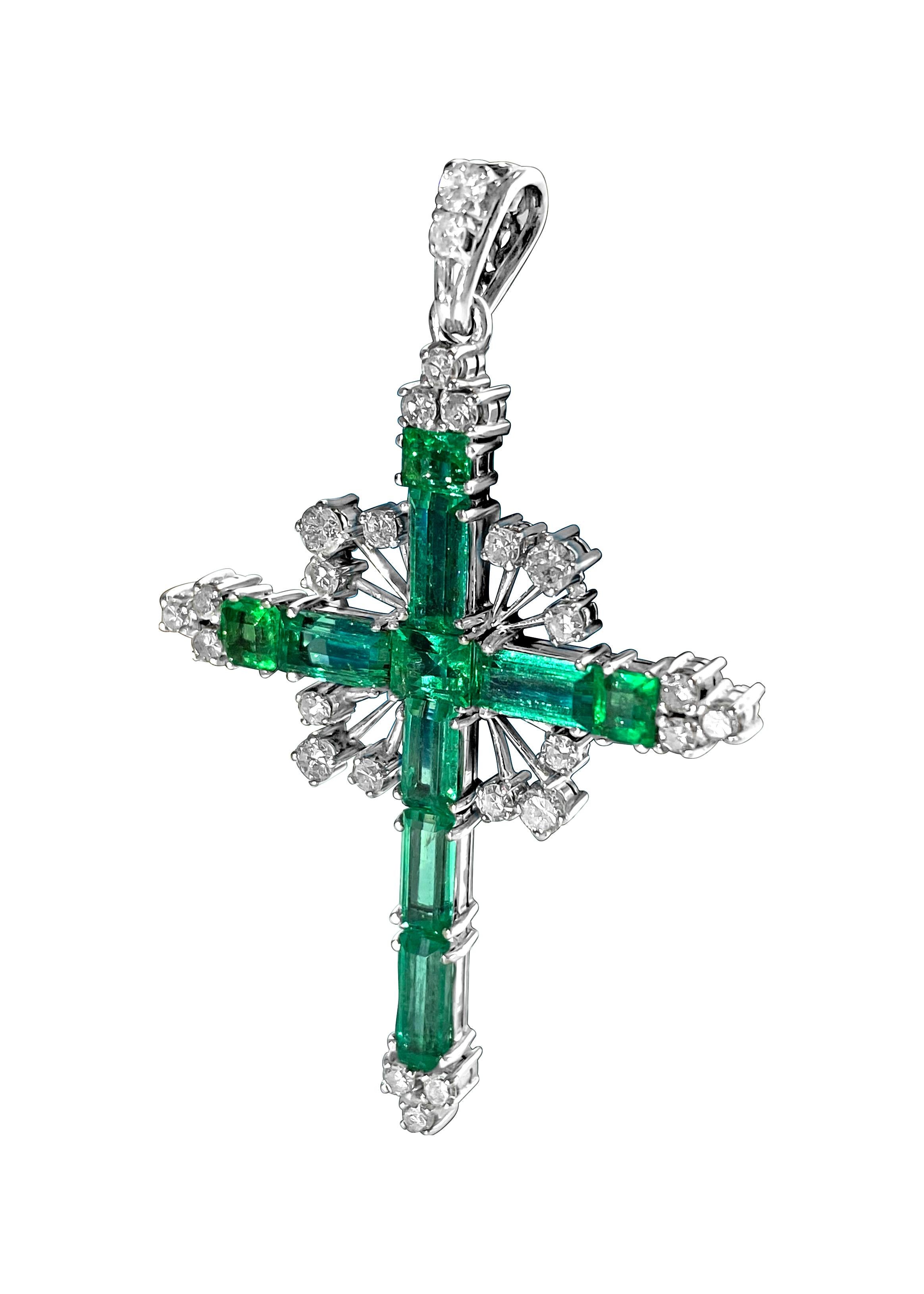 A beautiful necklace made of 18-karat white gold with a big green emerald that weighs 12.50 carats. The emerald is completely natural and comes from the earth. There are also 1.50 carats of diamonds in the necklace, which are very clear (VS-SI