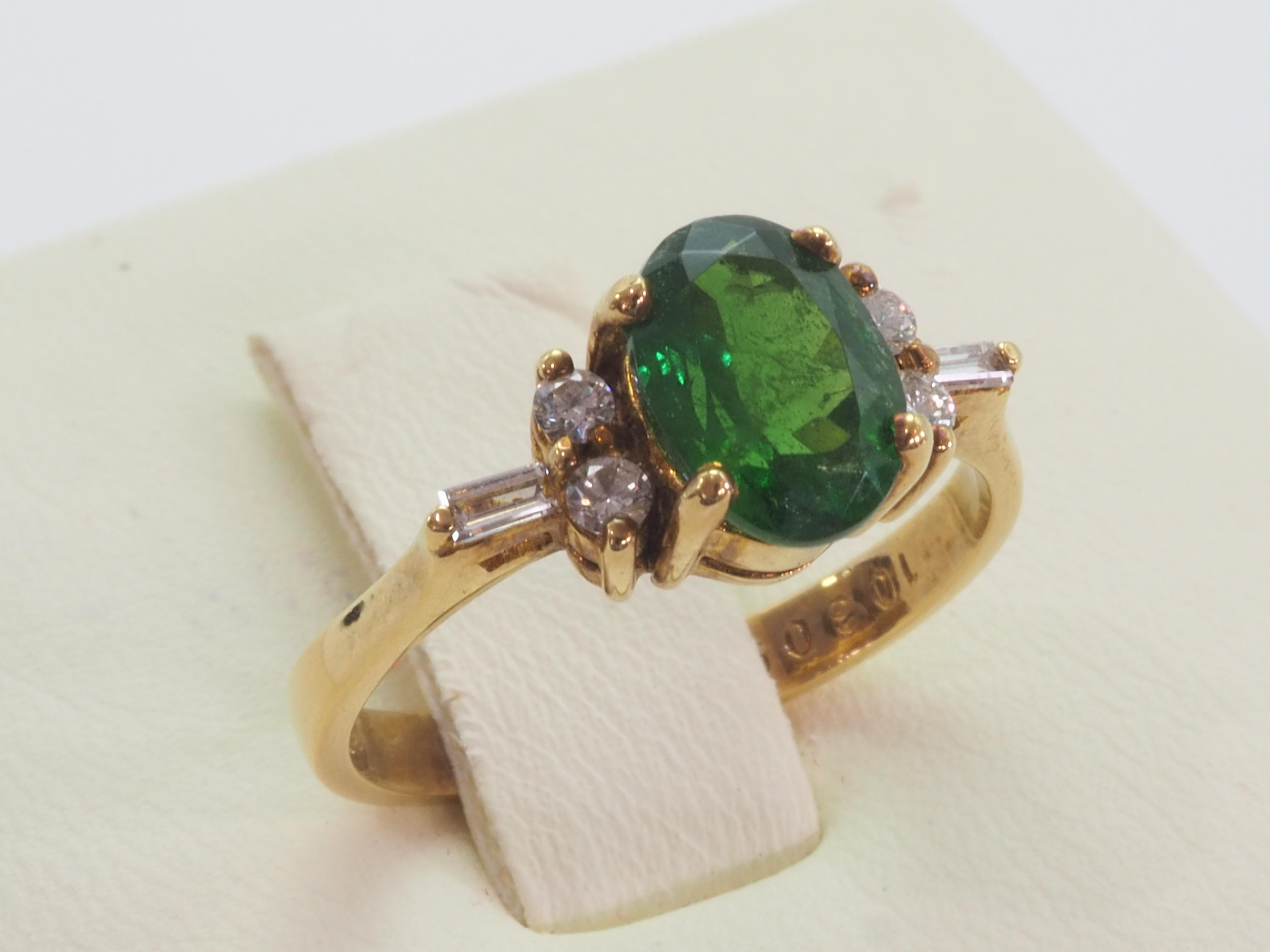 18K Gold 1.40ct Vivid Oval Tsavorite & 0.15ct Diamond Engagement Ring For Sale 1