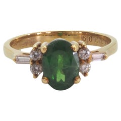 Anello di fidanzamento in oro 18K con tsavorite ovale vivida da 1,40 carati e diamante da 0,15 carati