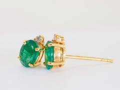 18K Gold 1.41ct Oval Vivid Green Emerald & 0.05ct Diamond Stud Earrings