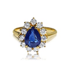 Bague en or 18 carats, saphir bleu de 1,50 carat et diamants