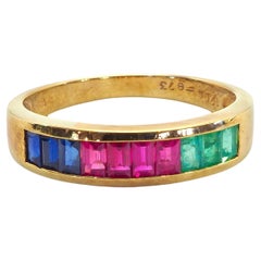 Anillo vintage de oro de 18 quilates con zafiro baguette, rubí y esmeralda de 1,50 quilates