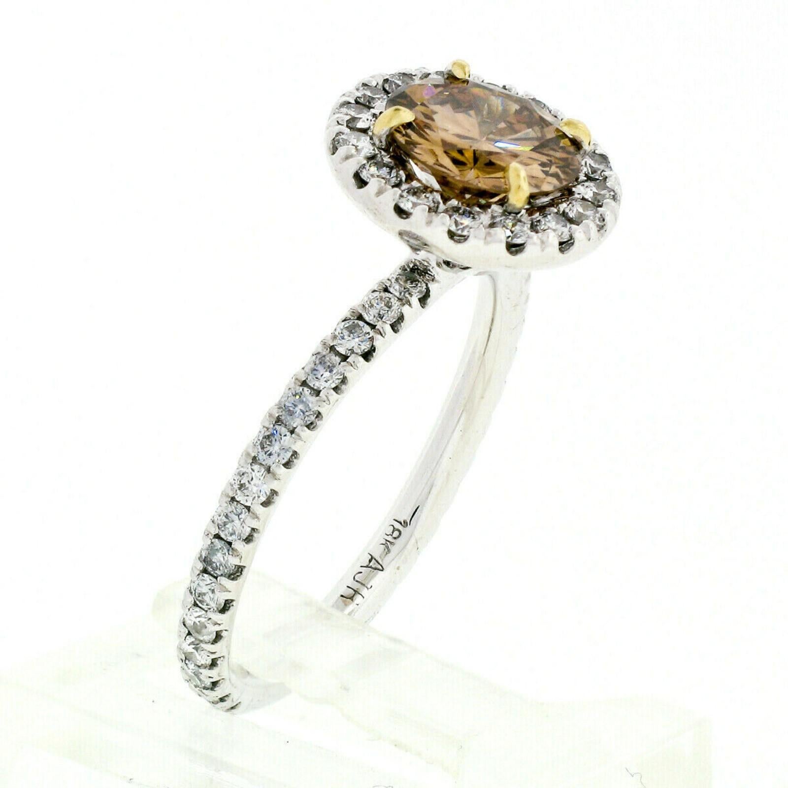 18 Karat Gold 1.56 Carat GIA Fancy Orange Brown Diamond Solitaire Halo Ring In Excellent Condition For Sale In Montclair, NJ