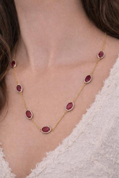 Collana in oro 18k con diamanti e rubini da 15,85 carati
