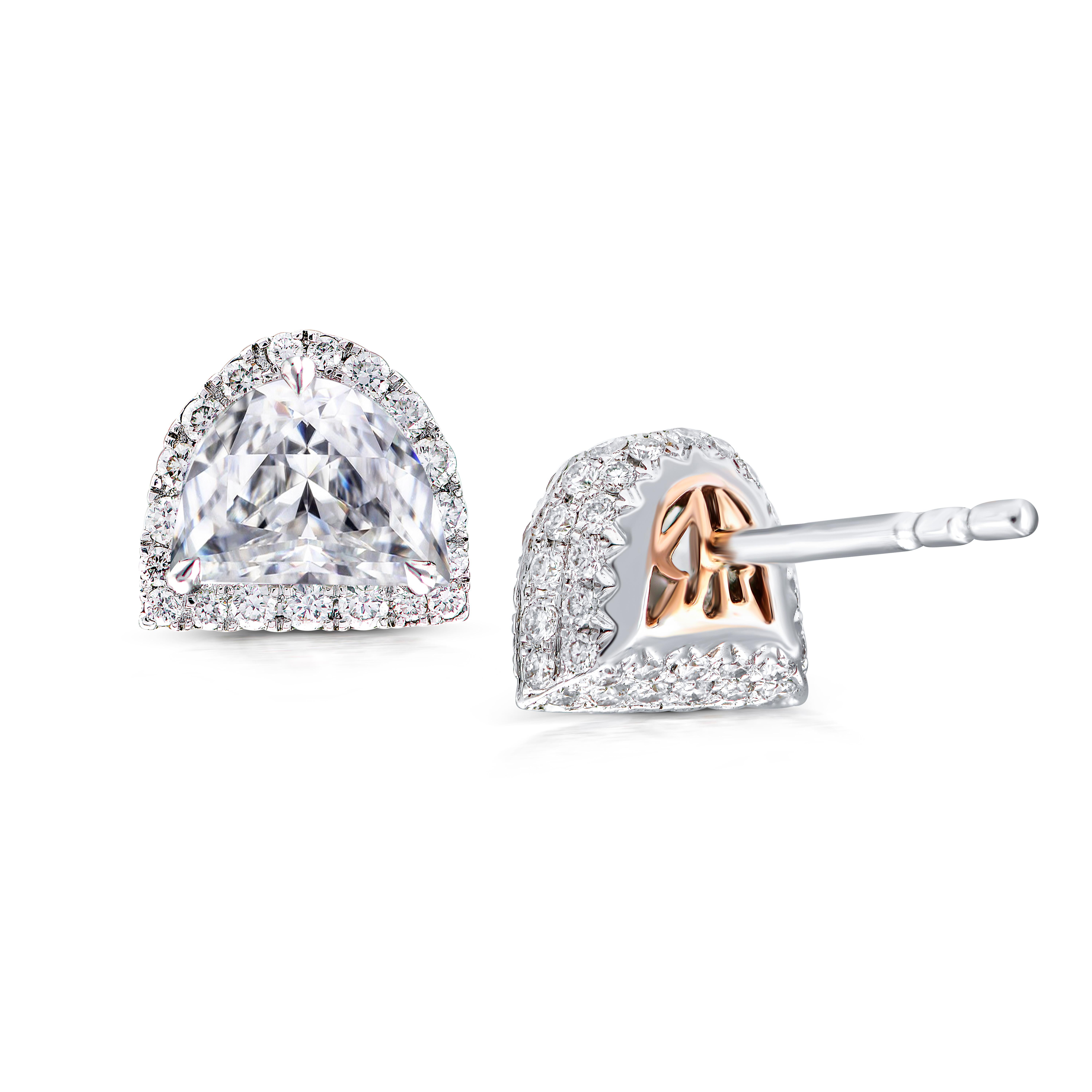 These exquisite Rarever earrings feature a stunning combination of old cut half moon diamonds and white gold. Each earring showcases a 0.58ct old cut half moon cut diamond with F color and VS clarity, delicately surrounded by a halo of over a
