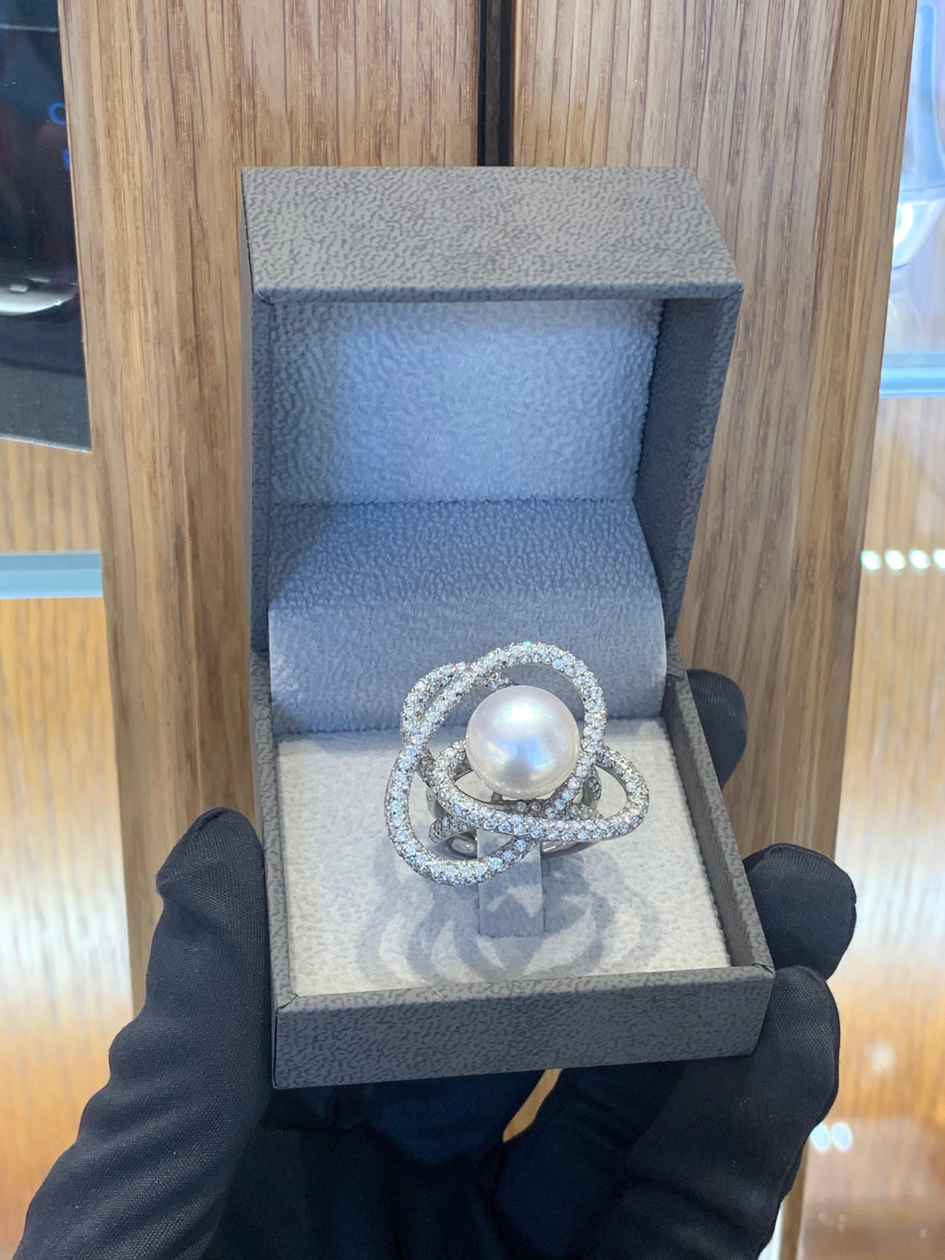 Beautifully Hand Crafted 18k White Gold Large Cocktail Ring Set With a Gorgeous Large White Pearl & Diamonds.
Amazing Shine, Incredible Craftsmanship.
Great Statement Piece.
Very Well Crafted.
Approximately 3.0 Carats Of Diamonds.
Approximately 15mm