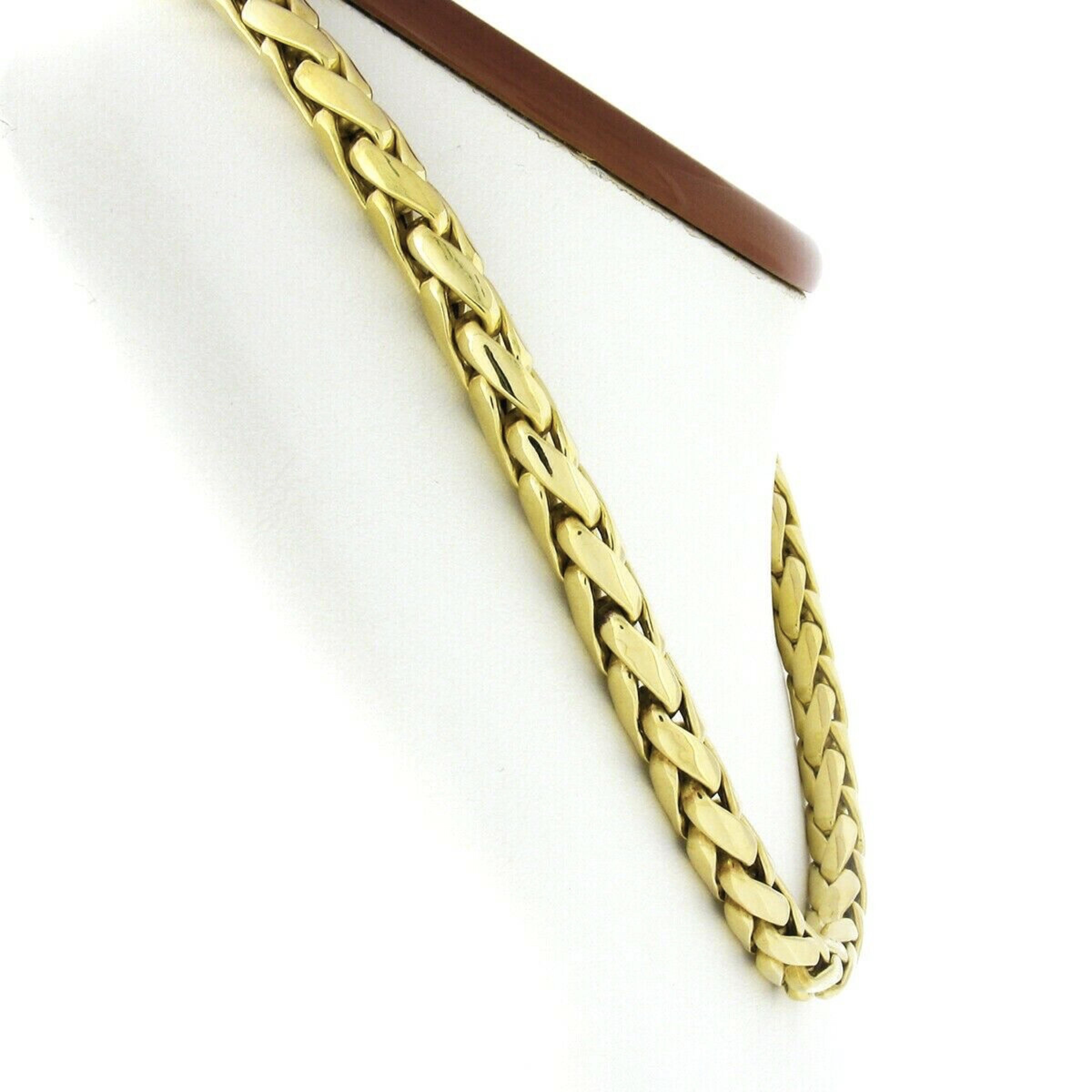 Here we have a gorgeous chain necklace crafted in solid 18k yellow gold featuring a wide wheat link design with a nice high polished finish throughout. This chain measures 16.5 inches in length and 7.5mm wide with a truly bold and absolutely elegant