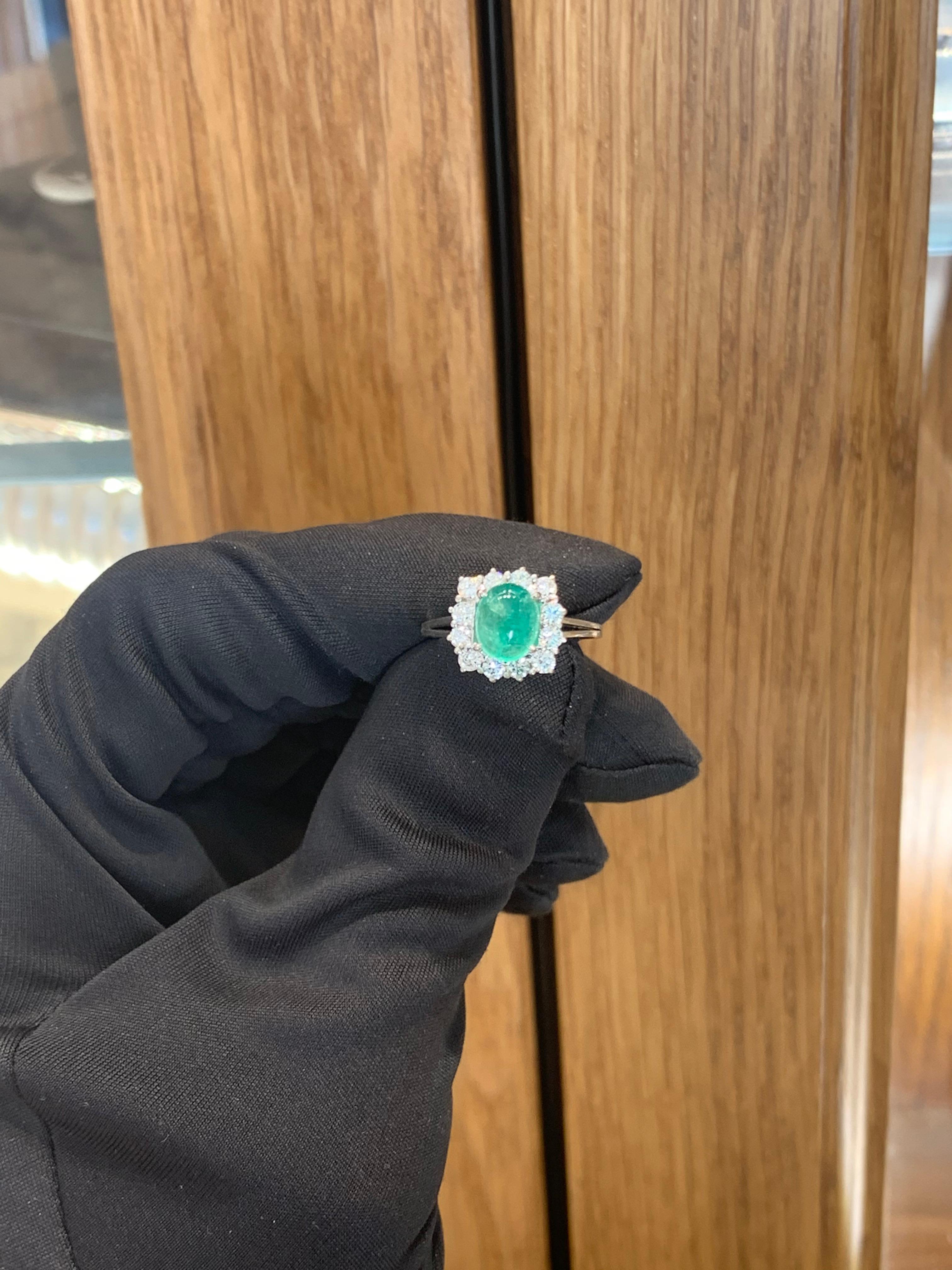 Beautifully Hand Crafted 18k Solid White Gold Green Emerald & Diamond Ring.
Incredible Craftsmanship, Very Well Made.
Approximately 1.8 Carat Cabochon Green Emerald.
Approximately 1.0 Carat of Diamonds.
Top Quality. Nice & Clean Stones.
Comfortable