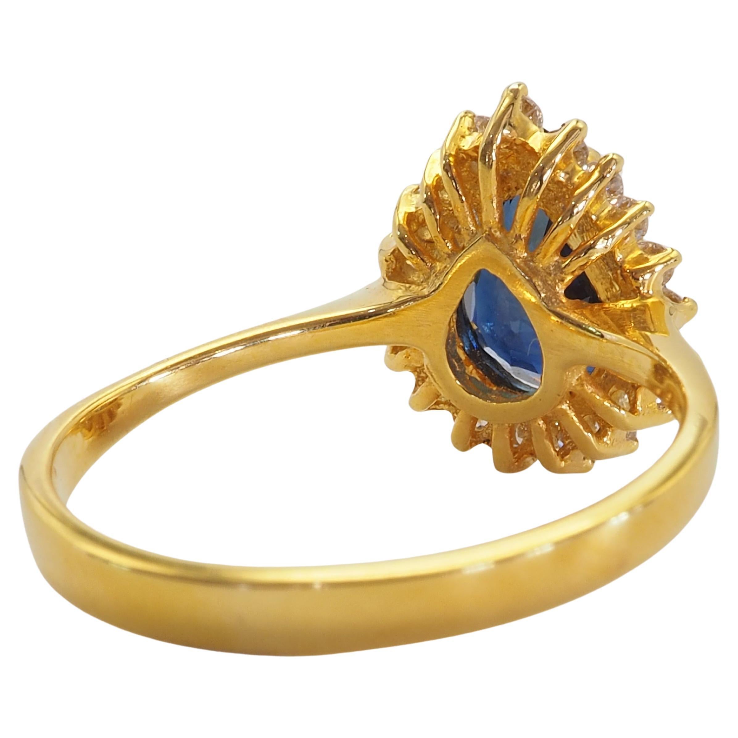 Taille poire Bague fine en or 18 carats avec saphir bleu poire 1,83 carat et halo de diamants 0,28 carat en vente