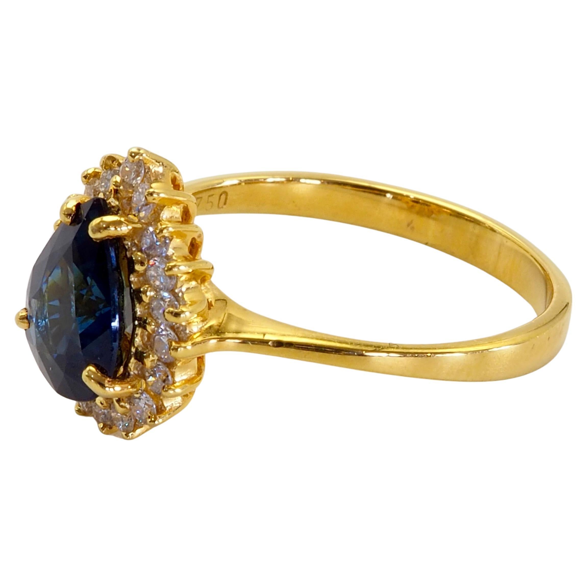 Bague fine en or 18 carats avec saphir bleu poire 1,83 carat et halo de diamants 0,28 carat Pour femmes en vente
