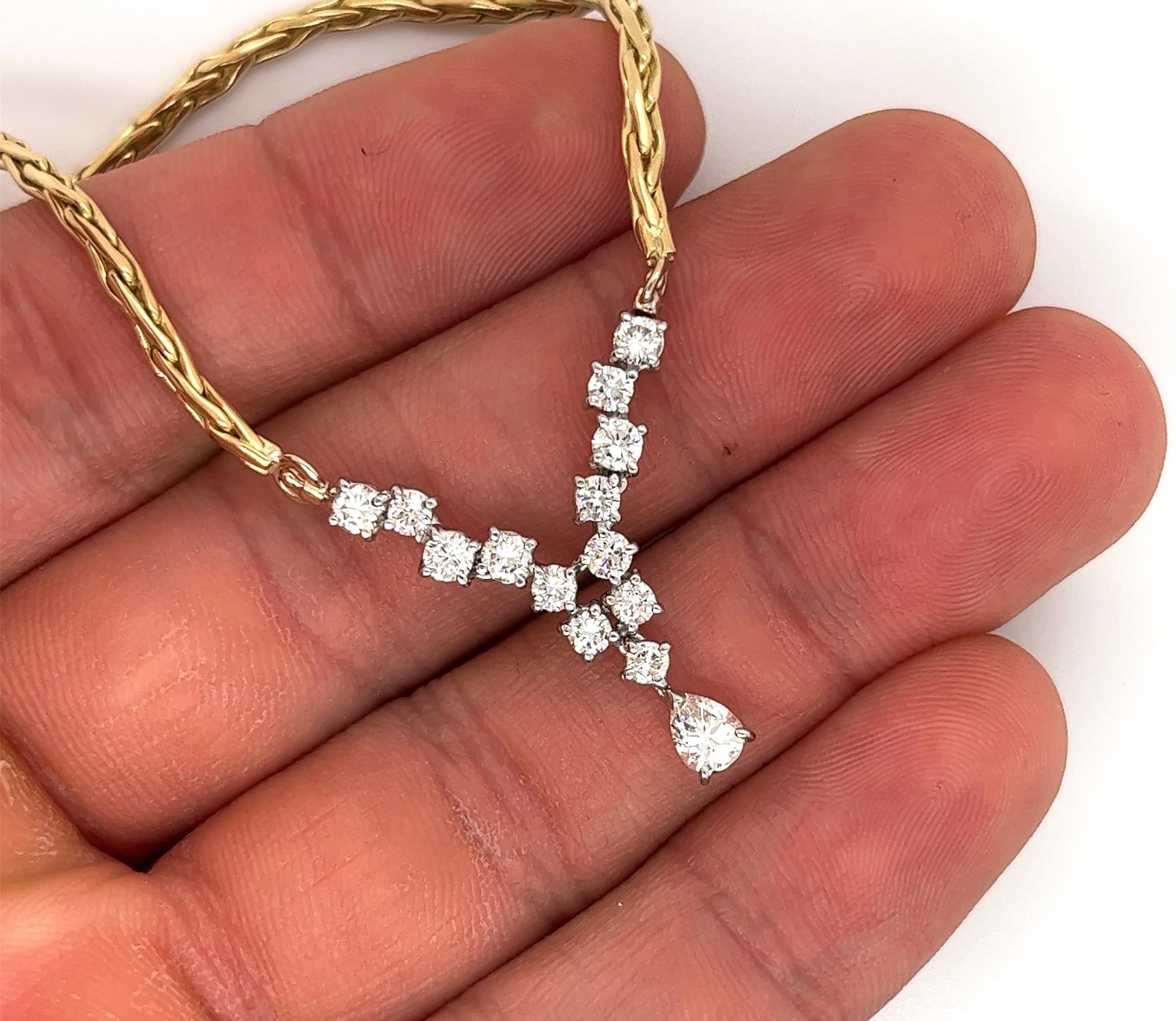 18-karat gold wheat-style choker chain sets 1.55 carats in pear and round cut natural diamonds. Handmade with a secure box closure and additional safety clip. 
Made in 2-tone with a yellow gold chain and white gold mounting for the diamonds. The