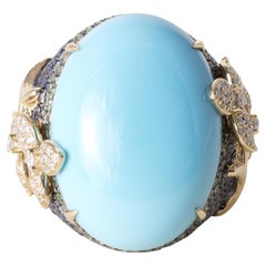 18K Gold 21.17 Carat Turquoise Oval Sapphire and Diamond Floral Ring 18K Gold 21.17 Carat Turquoise Oval Sapphire and Diamond Floral Ring