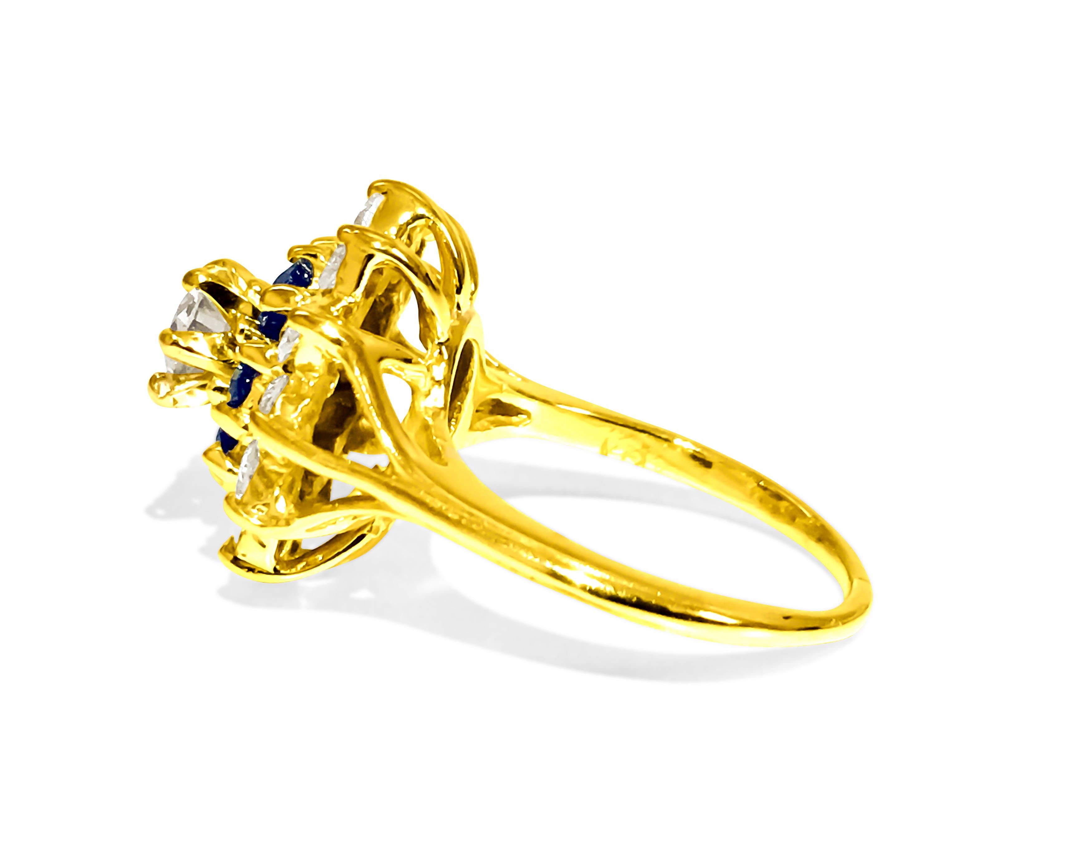 Radiate sophistication with this exquisite ring crafted from 18K yellow gold, featuring a dazzling 0.76 carat center diamond, flanked by 1.00 carat side diamonds, all boasting VS clarity and G color. Accentuating the design are 0.36 carats of blue