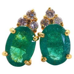 18K Gold 2.15ct Oval Emerald 
0.10ct Diamond Fine Stud Earring