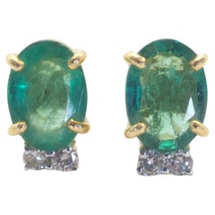 18K Gold 2.15ct Oval Emerald 
0.10ct Diamond Fine Stud Earrings