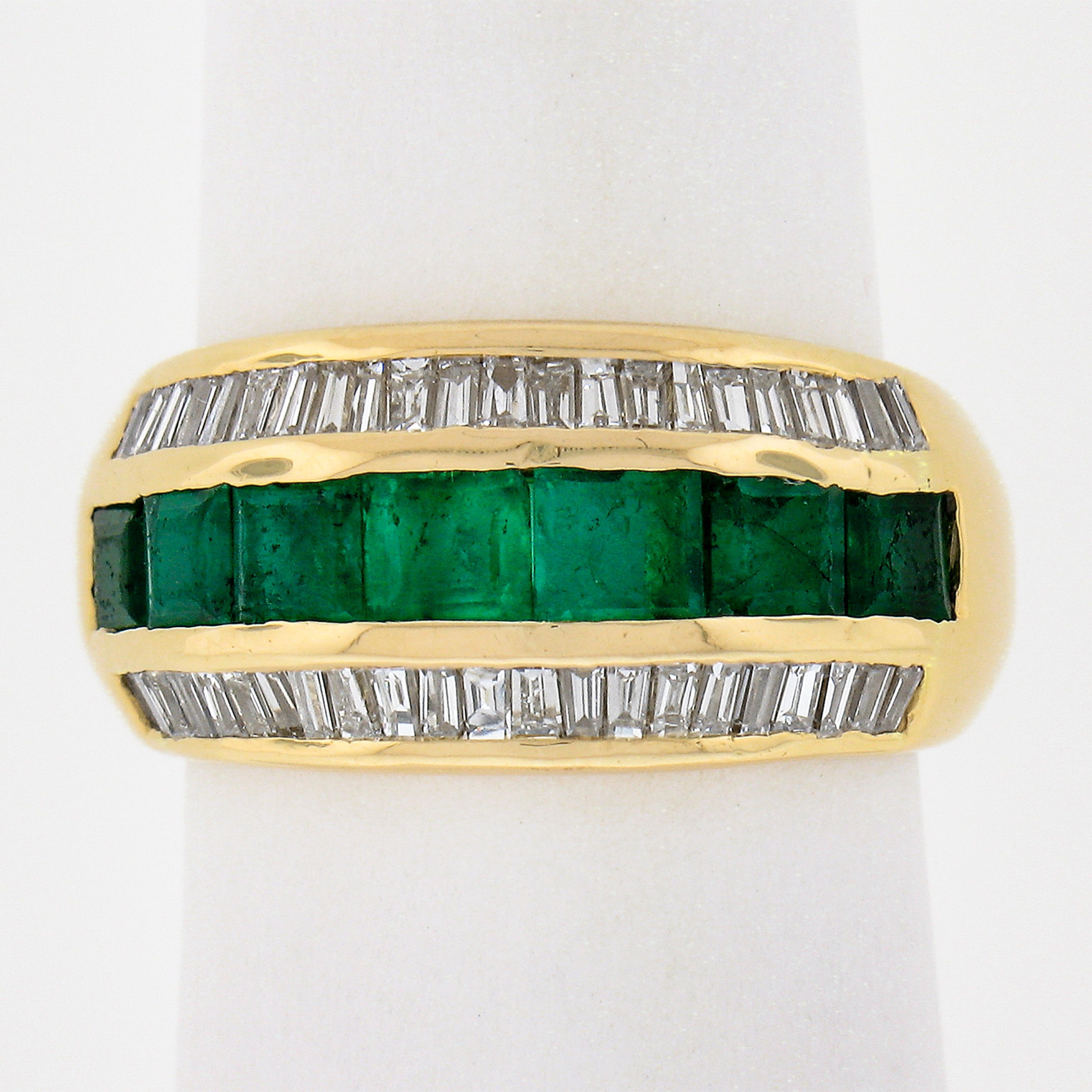 Here we have a vintage 3 row wide slightly domed band ring crafted from solid 18k yellow gold. It features 7 square step cut emeralds across its top that are very nice deep green color. The emeralds are further flanked on either side by tapered
