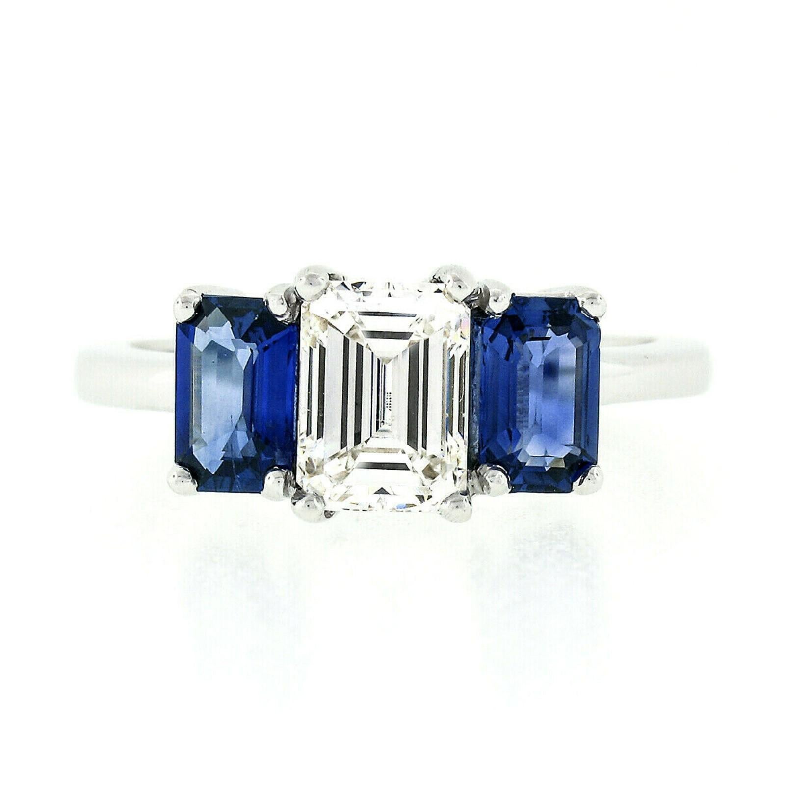 18 Karat Gold 2.45 Carat GIA Emerald Cut Diamond and Sapphire 3 Three Stone Ring In New Condition In Montclair, NJ