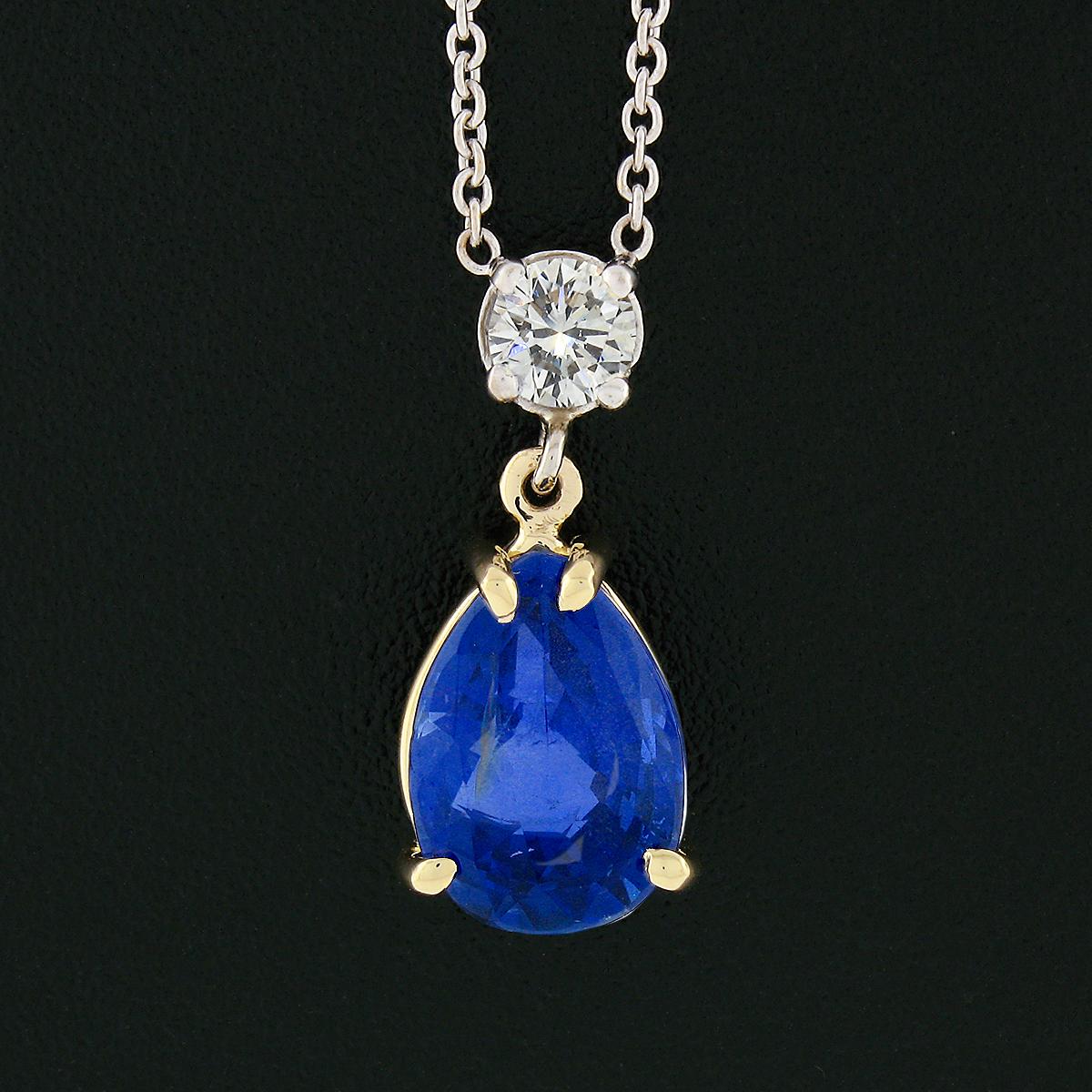 Here we have a gorgeous sapphire and diamond pendant necklace crafted from solid 18k white gold with a solid 18k yellow gold basket. The necklace is 16 1/2 inches in length and the chain is a simple fine cable link so as to allow more focus on the