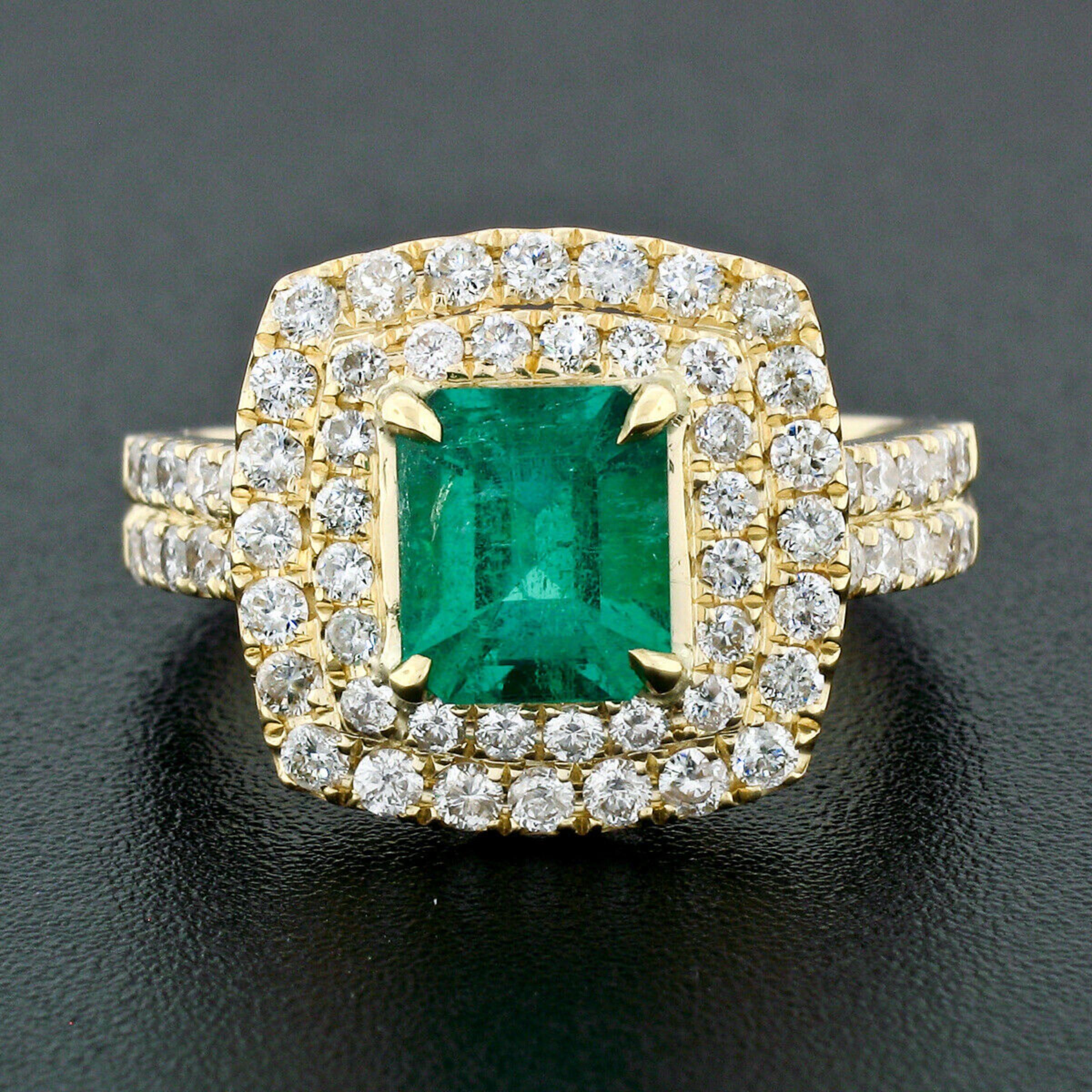 This truly breathtaking, GIA certified, emerald and diamond cocktail ring is crafted in in solid 18k yellow gold. The ring features a breathtaking, natural, octagonal step cut emerald stone that displays one of the FINEST and most lively rich green