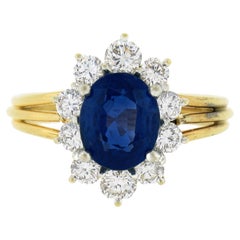 Anillo de cóctel de oro de 18 quilates con diamante halo ovalado de zafiro azul de 2,95 ctw GIA Birmania sin calor