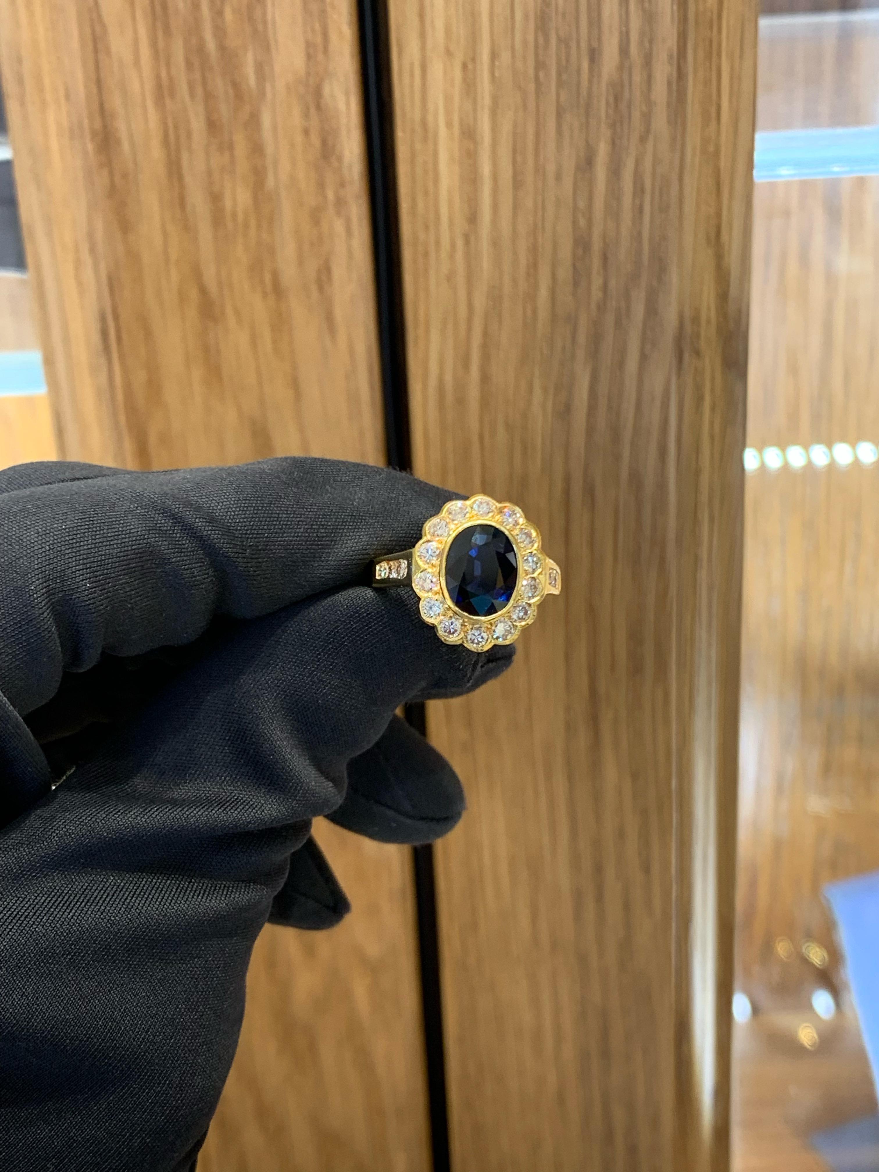 Beautiful Oval Cut Blue Sapphire & Diamond Flower Ring Set In 18k Yellow Gold.
Amazing Shine, Incredible Craftsmanship.
Great Statement Piece.
Very Well Crafted.
Approximately 3.0 Carats Blue Sapphire.
Approximately 1.0 Carats Of Diamonds.
Nice &