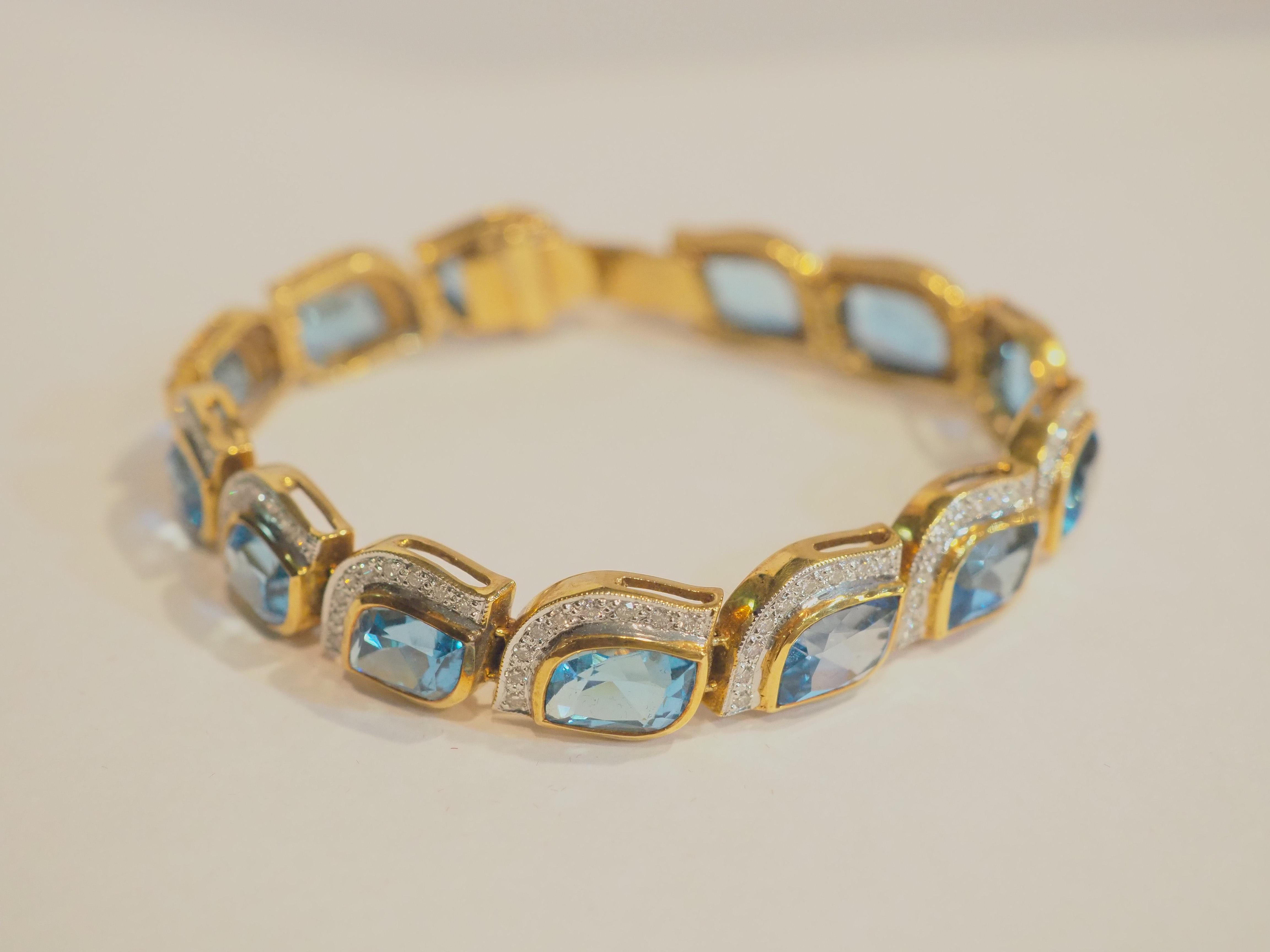 18K Gold 30.16 Carat Mixed Cut Blue Topaz & 1.41ct Diamond Bracelet For Sale 3